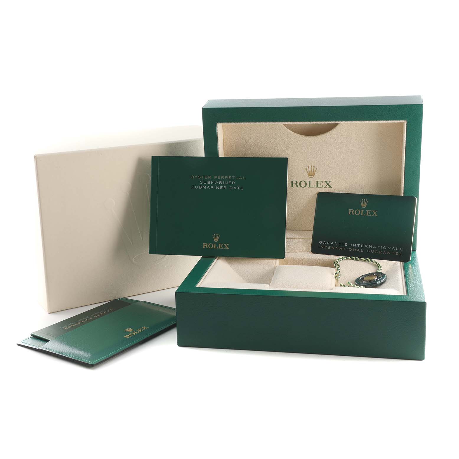 The image shows the box and accessories of a Rolex Submariner 126613 Men's Steel and Gold (two tone) Blue Dial 126613 Men's Steel and Gold (two tone) Blue Dial, including the manual, warranty card, and green tag.
