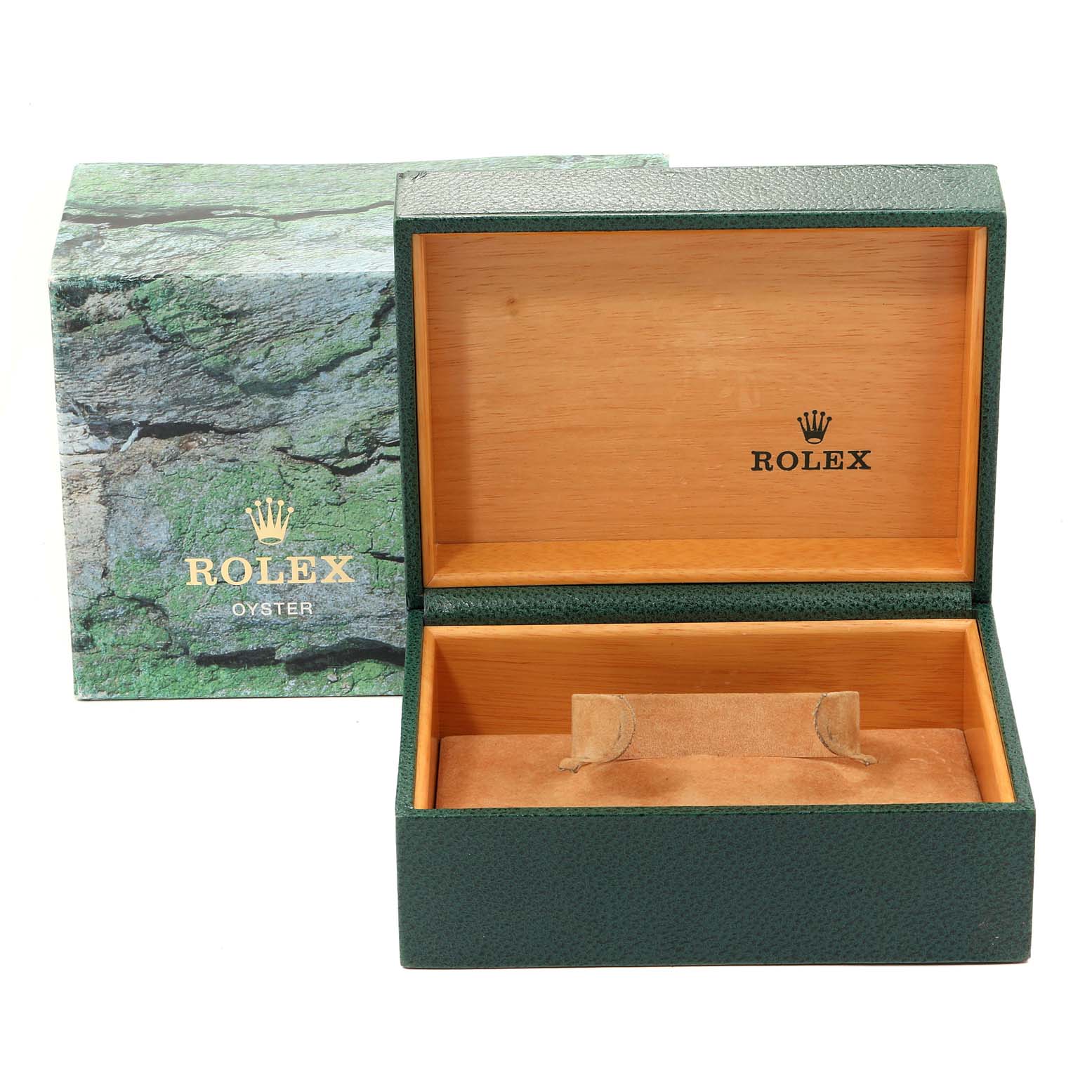 The image shows an open green and wood Rolex watch box for the Submariner model, with the outer packaging in the background.