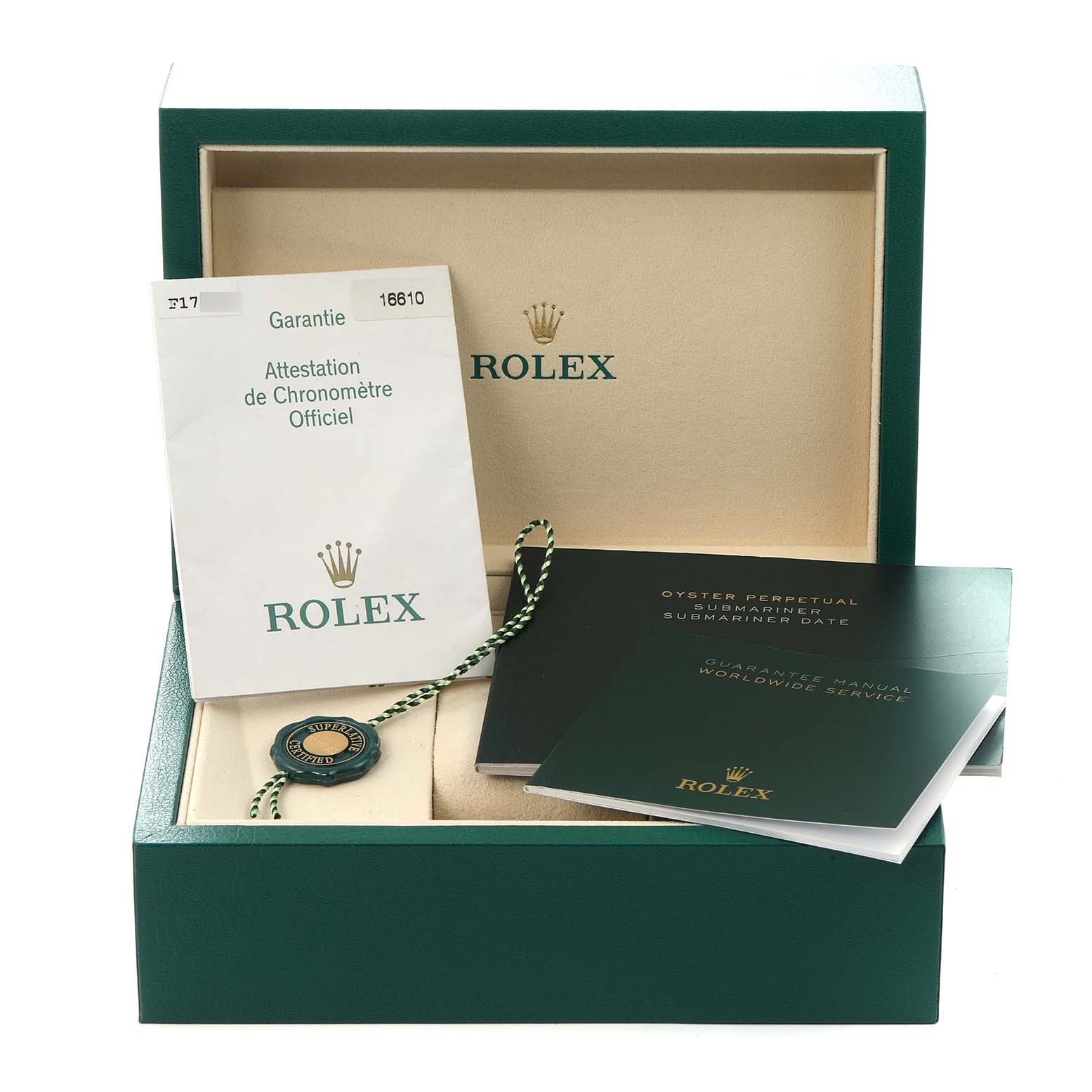 The image shows the packaging and documentation for a Rolex Submariner 16610 Men
s Stainless Steel Black Dial, including manuals and a tag, displayed from the front.