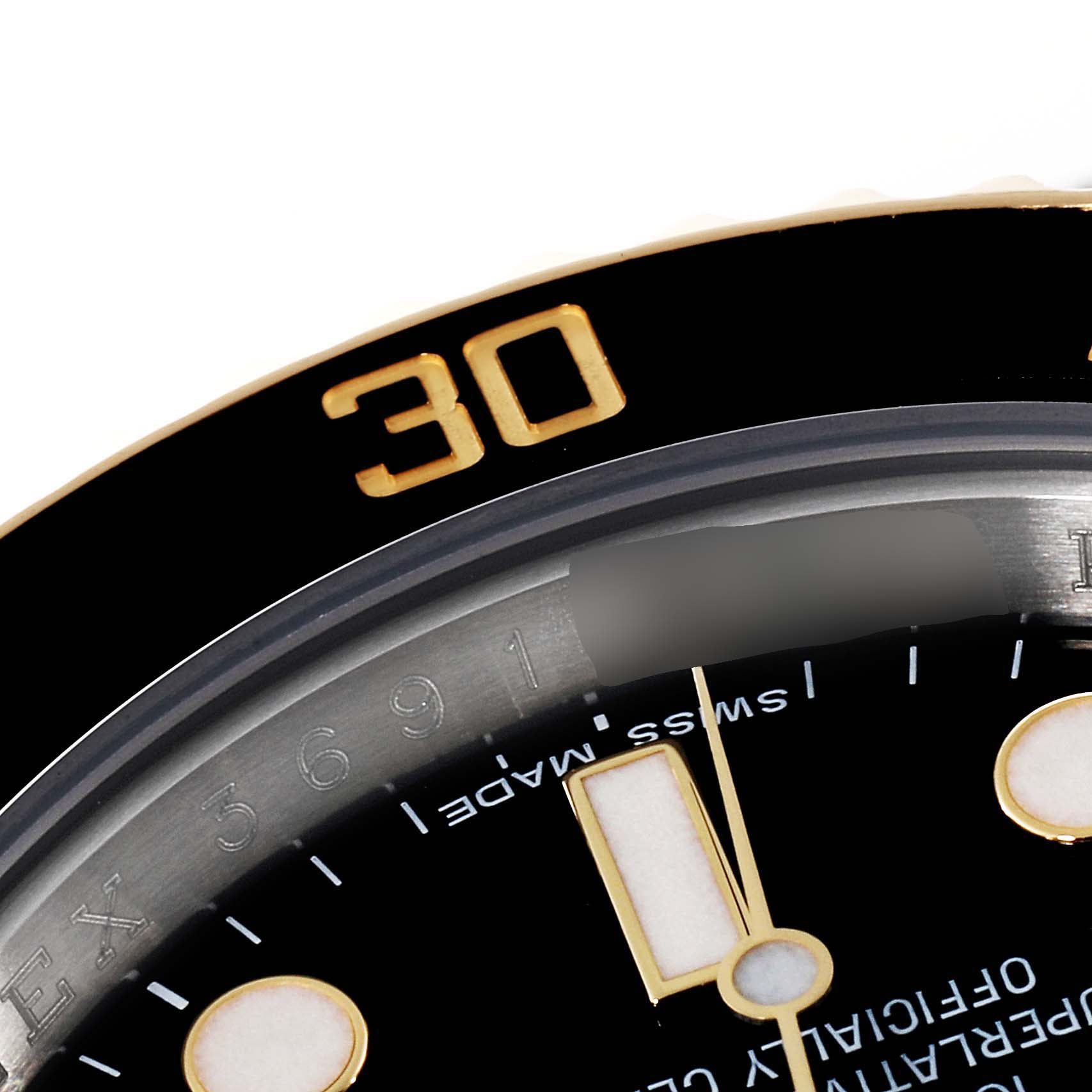 This close-up angle shows the bezel and part of the dial of a Rolex Submariner 116613 Men's Steel and Gold (two tone) Black Dial 116613 Men's Steel and Gold (two tone) Black Dial watch, highlighting the "30" marker.