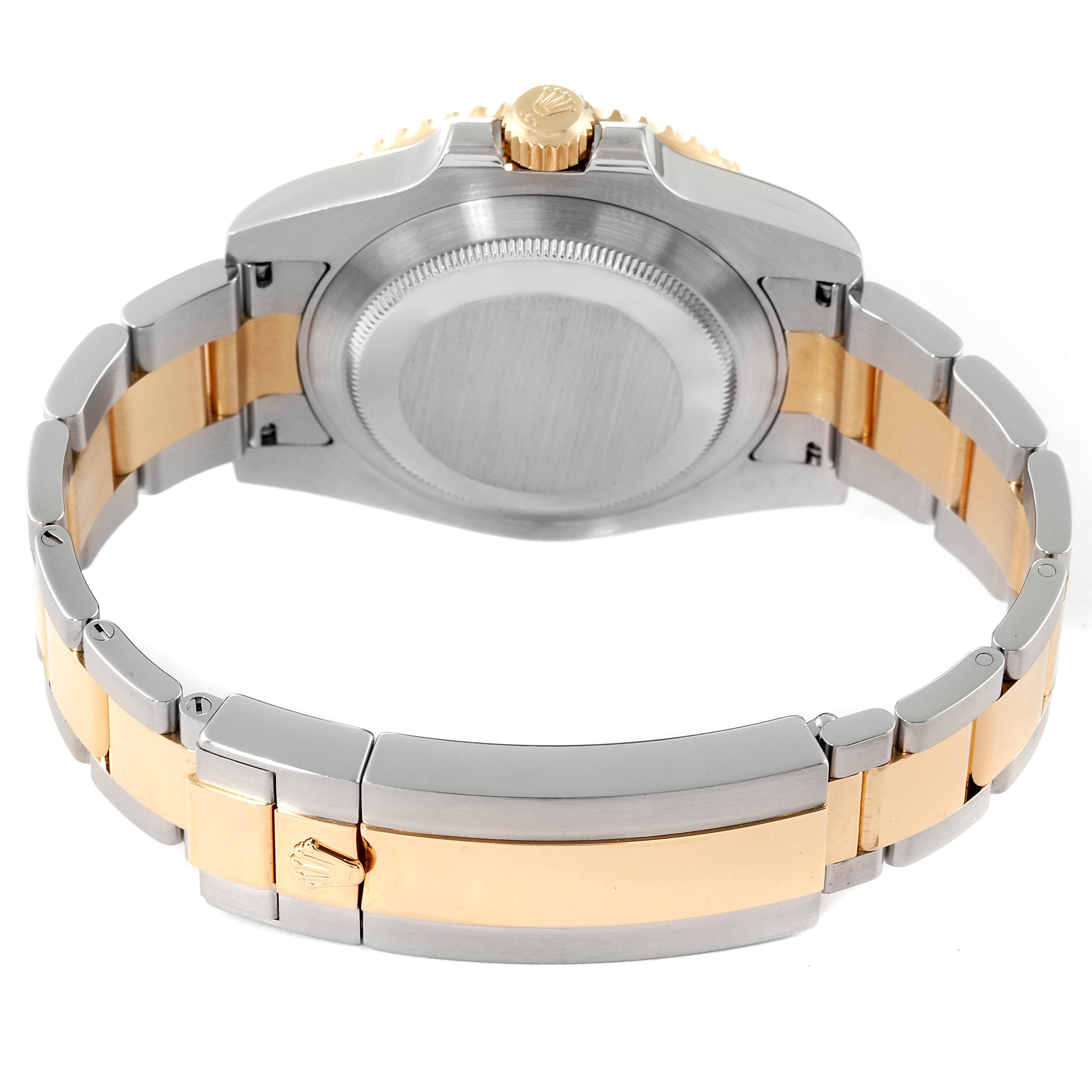 The image shows the back case and bracelet of the Rolex Submariner 116613 Men's Steel and Gold (two tone) Black Dial 116613 Men's Steel and Gold (two tone) Black Dial watch, viewed from a rear angle.