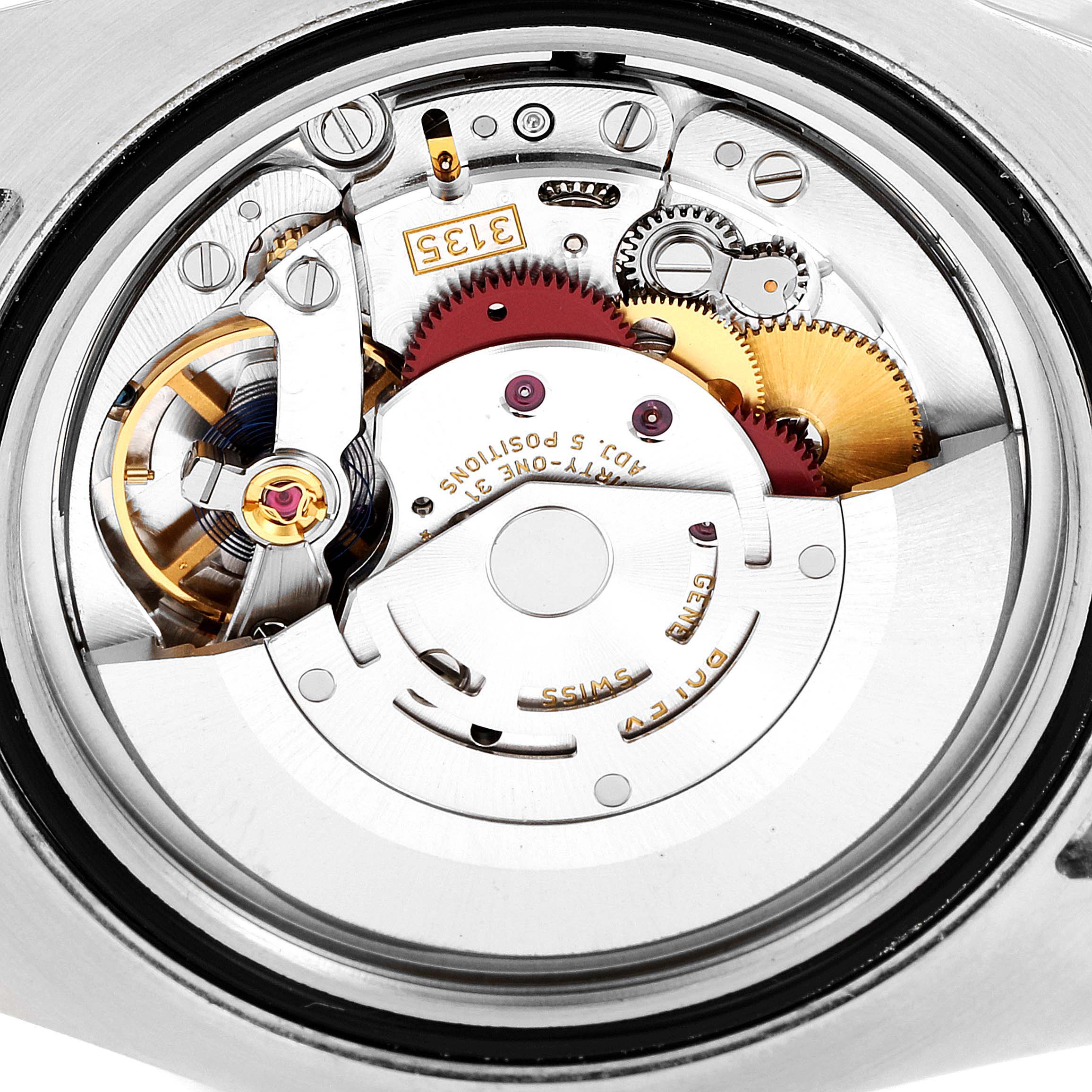 The image shows the movement and inner mechanical parts of a Rolex Submariner 116613 Men
s Steel and Gold (two tone) Black Dial 116613 Men
s Steel and Gold (two tone) Black Dial watch, viewed from the back.