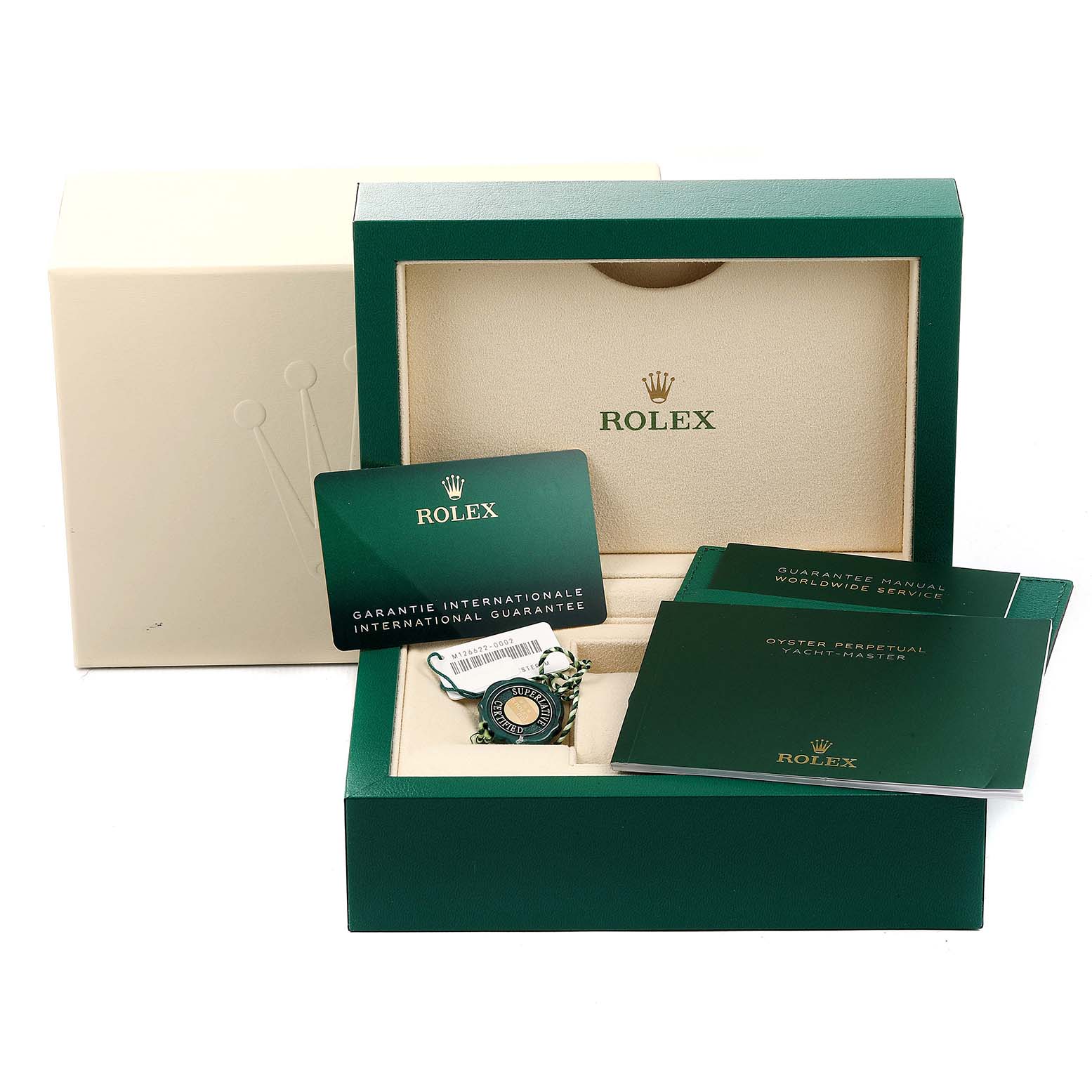 The image shows a Rolex Yacht-Master 126622 Men
s Stainless Steel Blue Dial 126622 Men
s Stainless Steel Blue Dial watch box with manuals, a guarantee card, and a tag showcasing the brand.