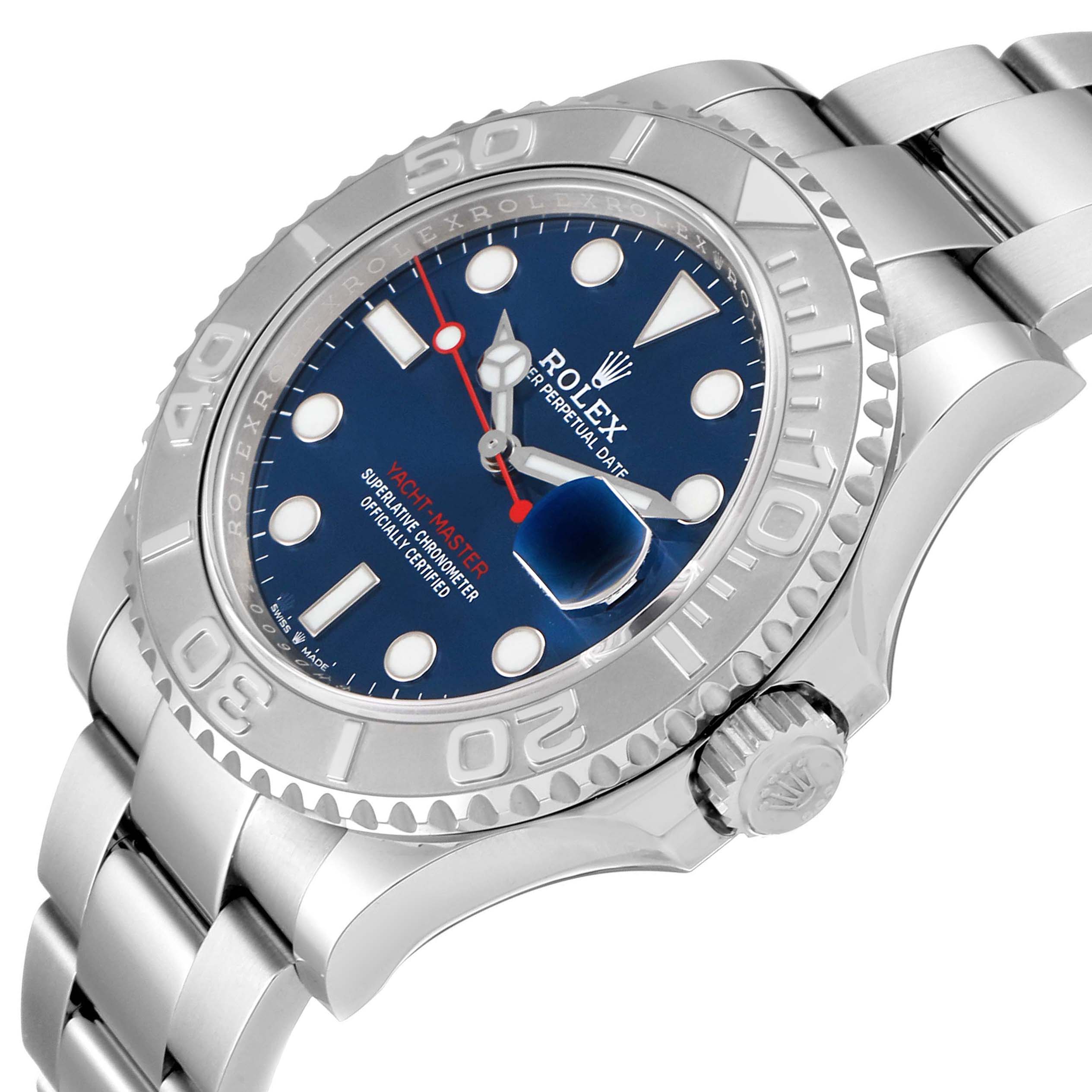 The Yacht-Master Rolex watch is shown from a side angle, highlighting its bezel, dial, and part of the bracelet.