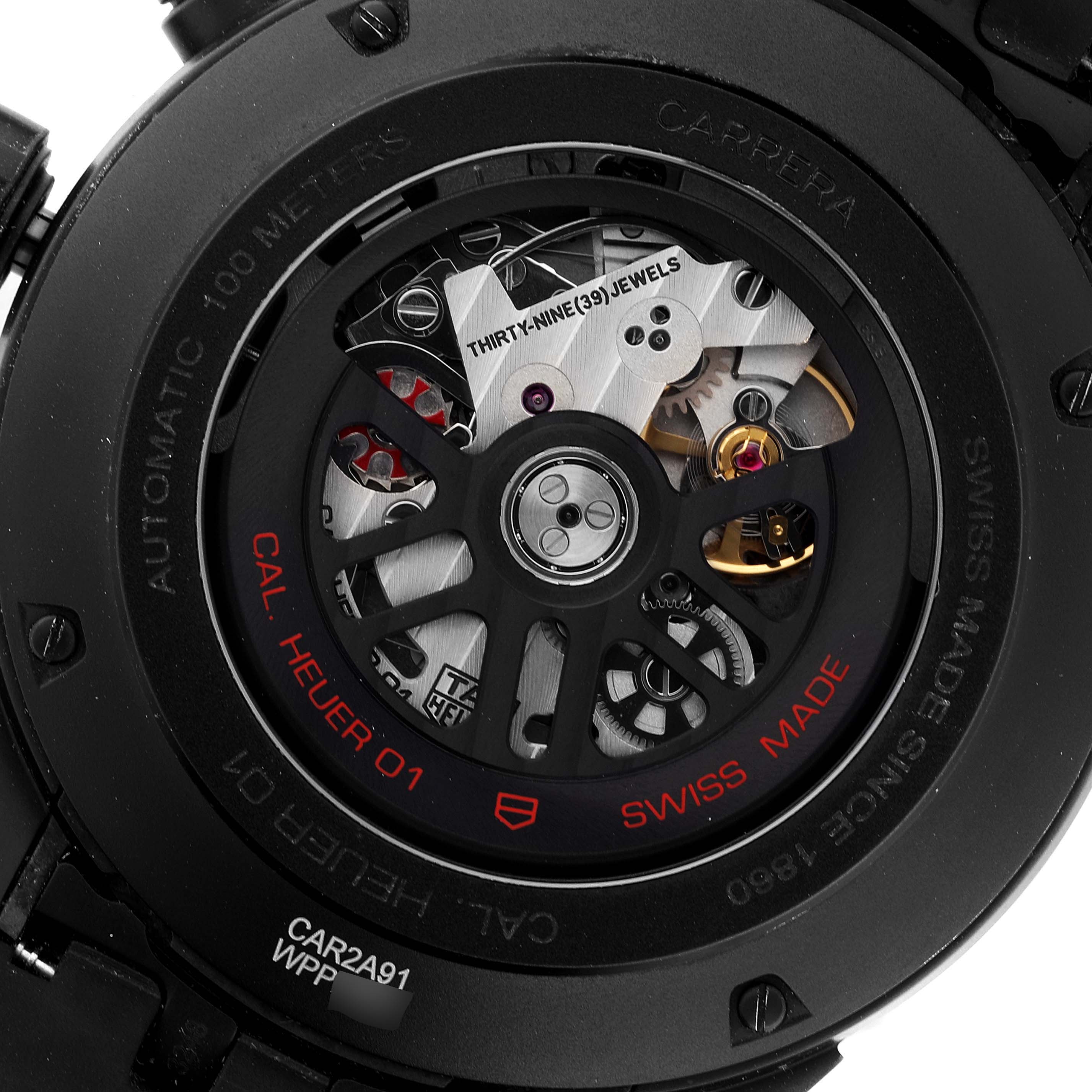This is the back view of the Carrera model by Tag Heuer, showing its intricate movement and internal mechanisms.