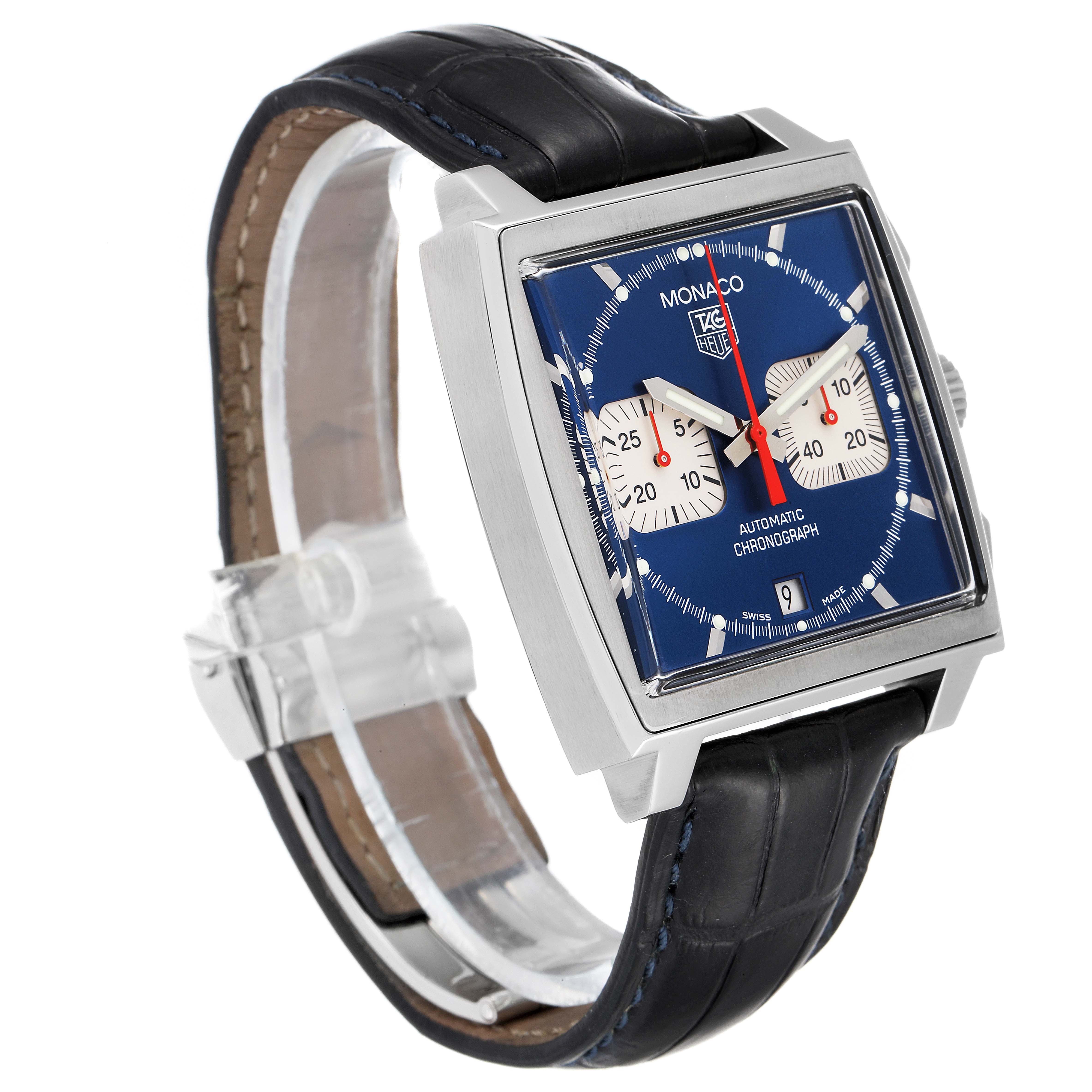 The Tag Heuer Monaco CW2113 Men
s Stainless Steel Blue Dial CW2113 Men
s Stainless Steel Blue Dial watch is shown from a three-quarter angle, highlighting its square face, blue dial, and black leather strap.