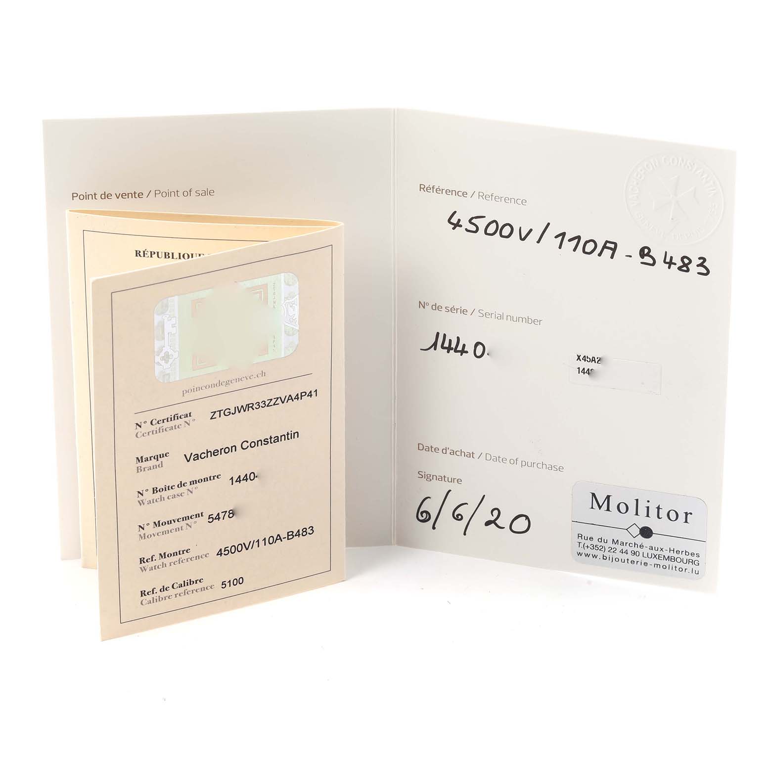 The image shows documentation and certification for the Vacheron Constantin Overseas 4500V Men
s Stainless Steel Black Dial model at a slight angle.