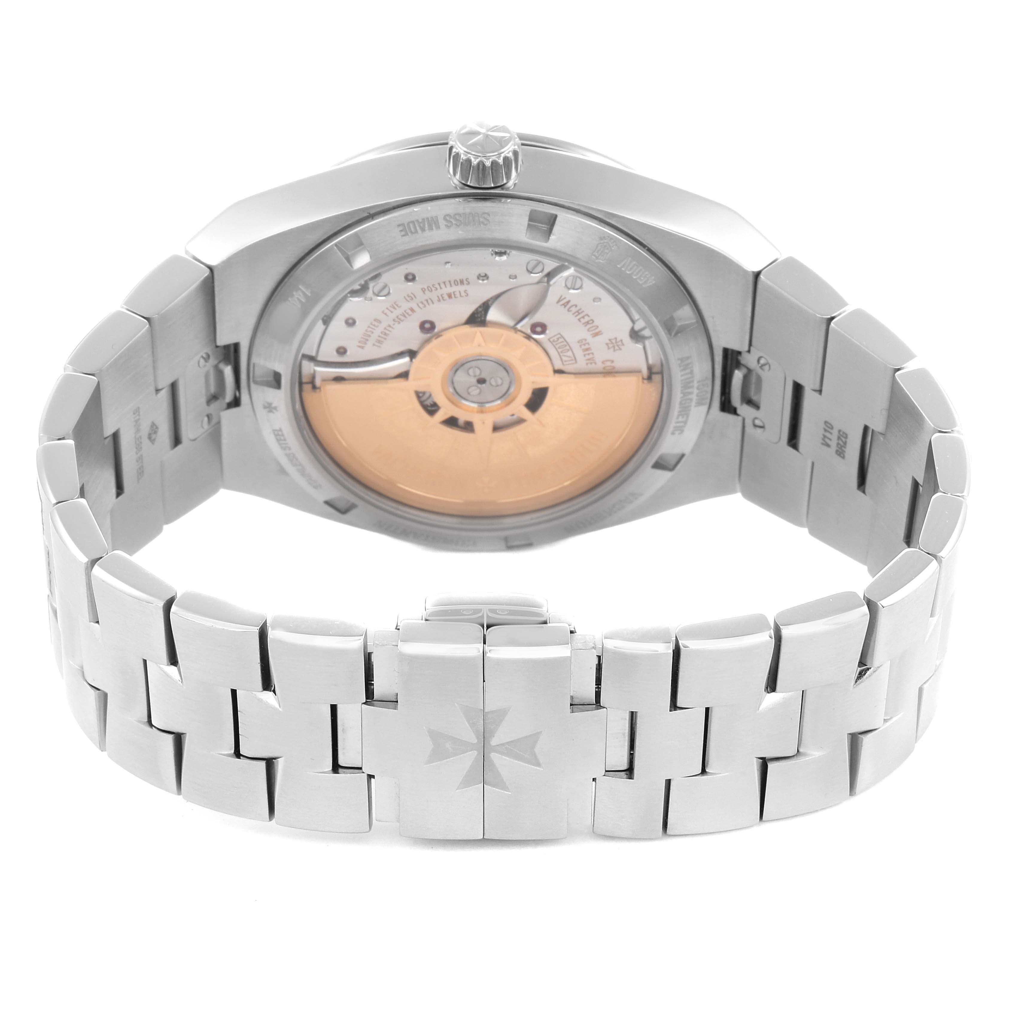 The Vacheron Constantin Overseas 4500V Men
s Stainless Steel Black Dial watch is shown from the back, revealing the movement through a transparent case back with the bracelet visible.