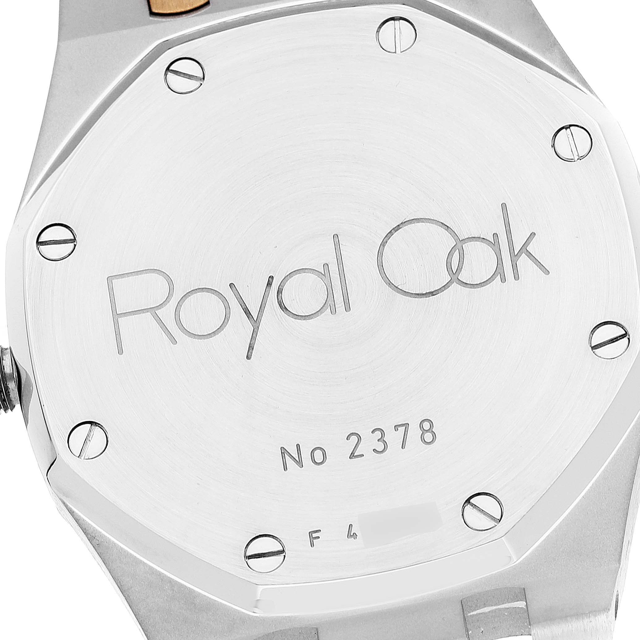 The image shows the back case of an Audemars Piguet Royal Oak 14790SA.OO.0789SA.08 Men's Steel and Gold (two tone) Silver Dial 14790SA.OO.0789SA.08 Men's Steel and Gold (two tone) Silver Dial watch, displaying its model name and serial number.