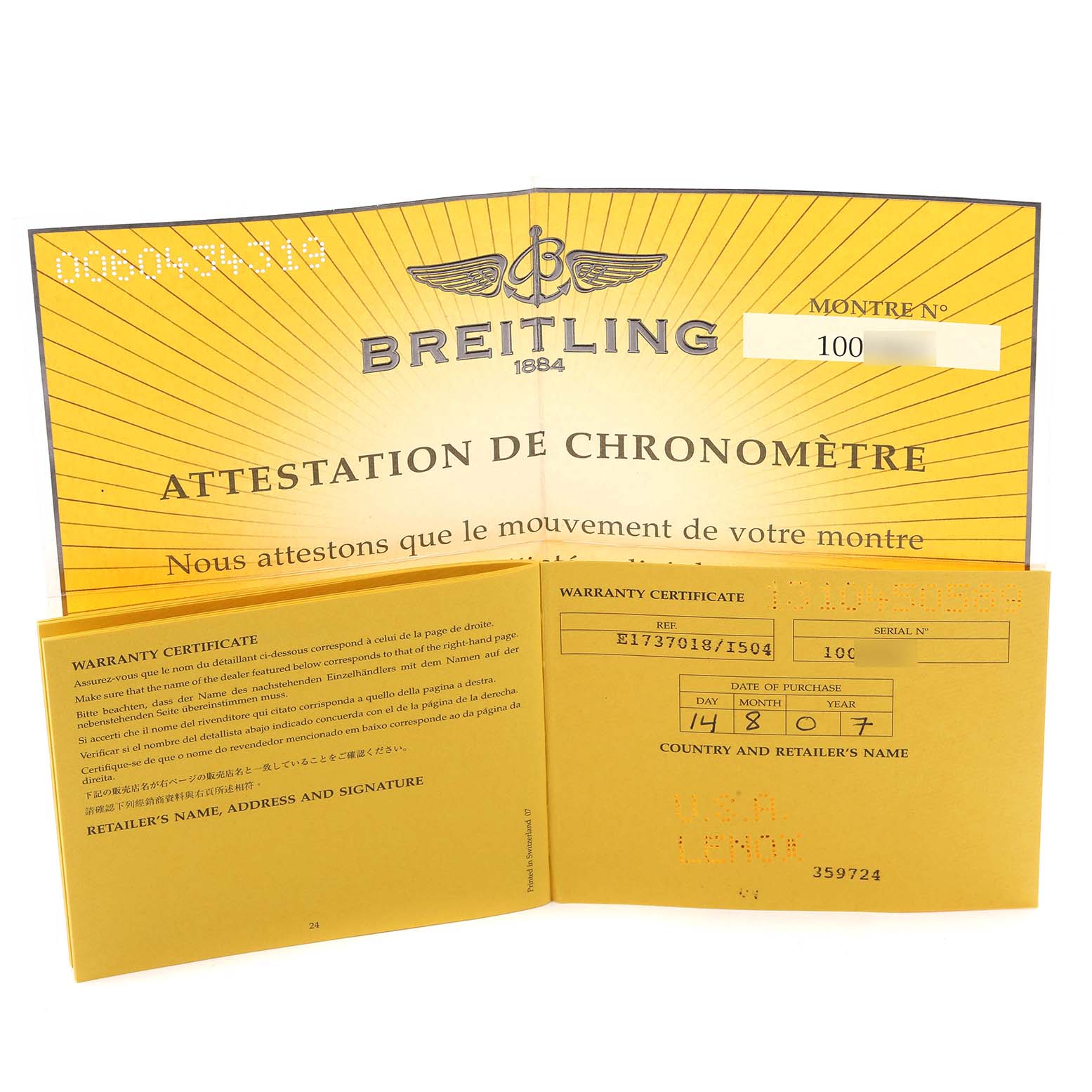 The image shows warranty certificates and a chronometer attestation for the Breitling Avenger E17370 Men
s Titanium Yellow Dial watch model.