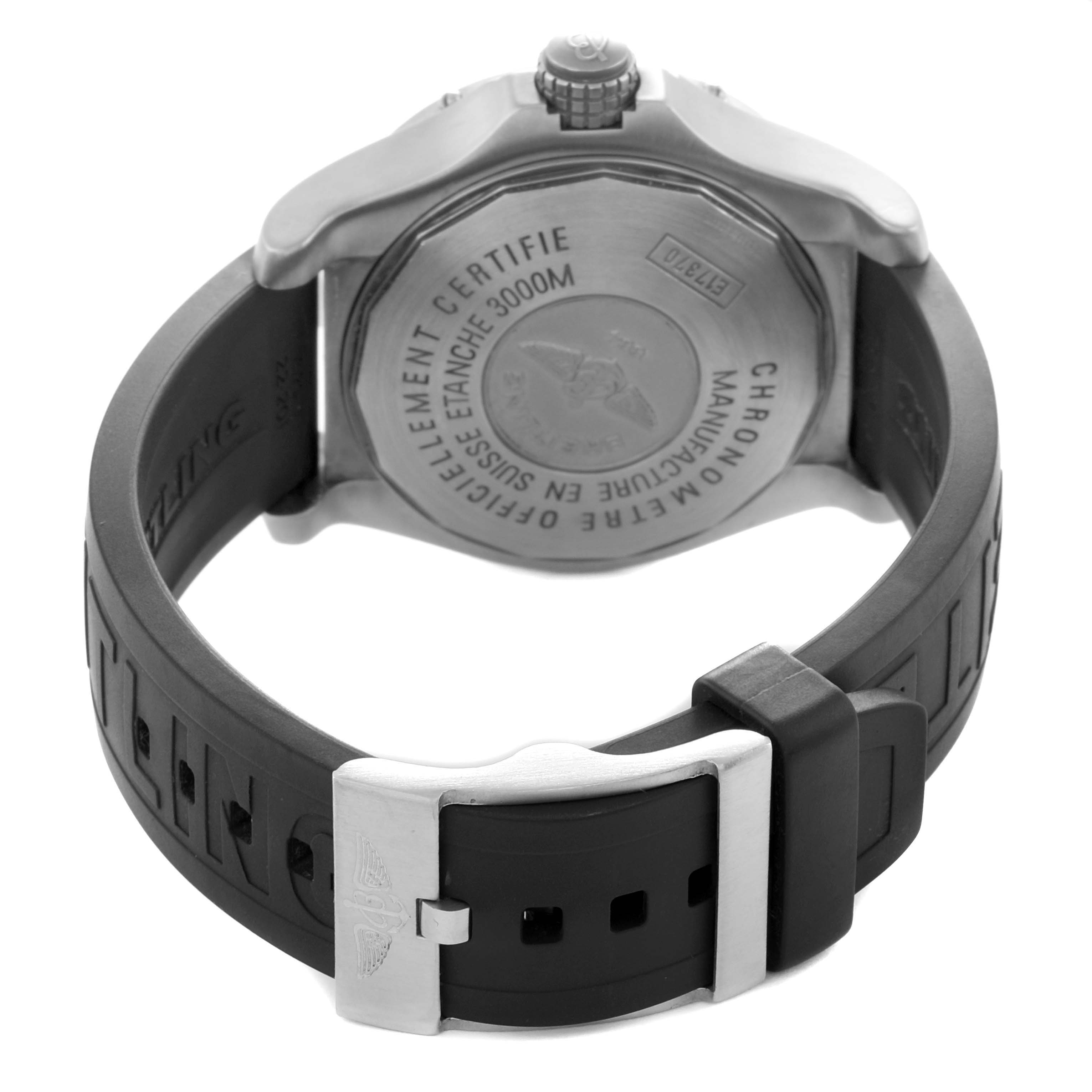 The photo shows the Breitling Avenger E17370 Men
s Titanium Yellow Dial watch from the back, highlighting the case back and rubber strap with a buckle.