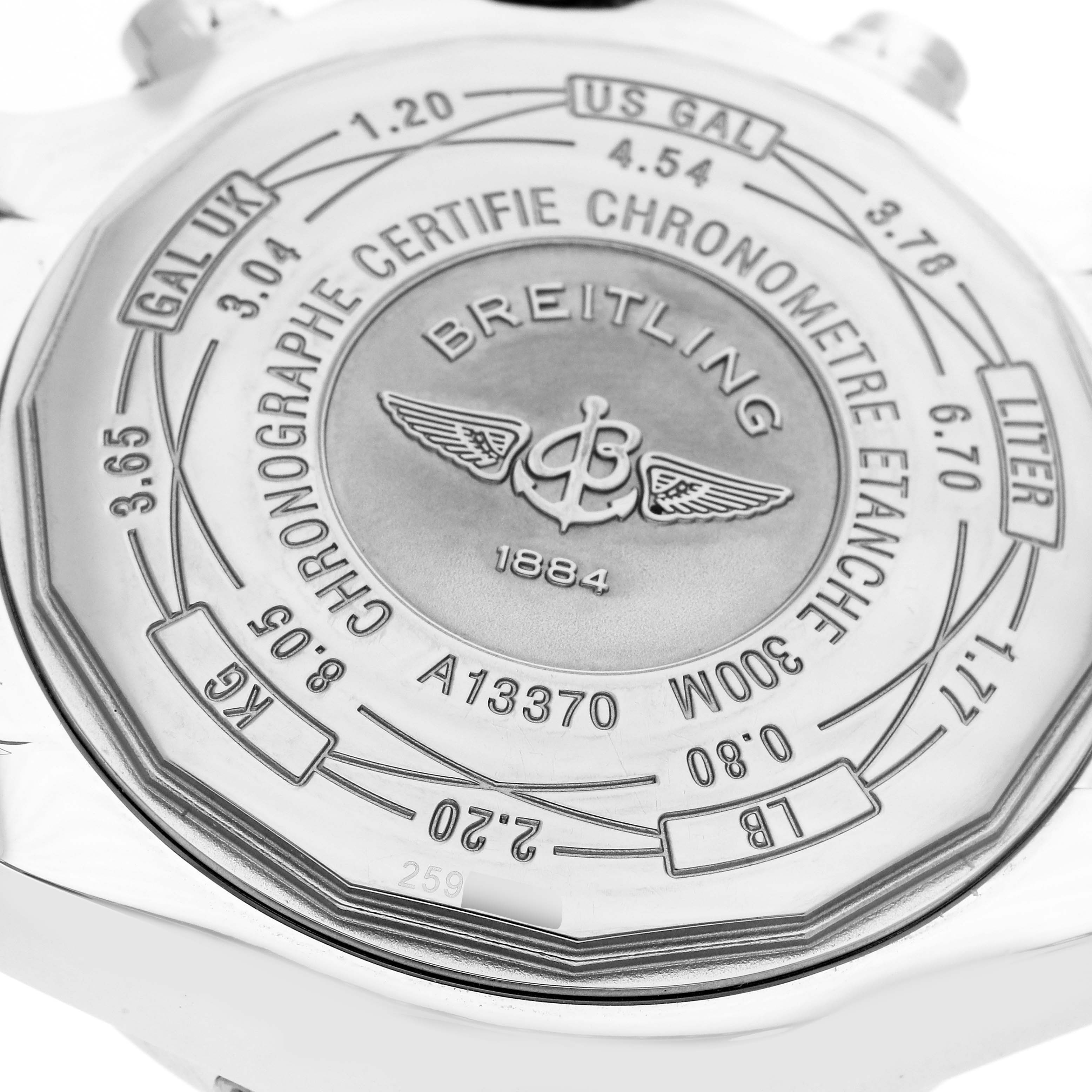 The image shows the back of a Breitling Avenger A13370 Men
s Stainless Steel Black Dial watch, highlighting its engravings and specifications.