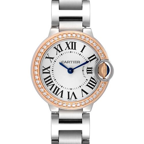 The Cartier Ballon Bleu WE902079 Women's Steel and Gold (two tone) Silver Dial watch is shown from the front, highlighting its dial, Roman numerals, diamond bezel, and metal bracelet.