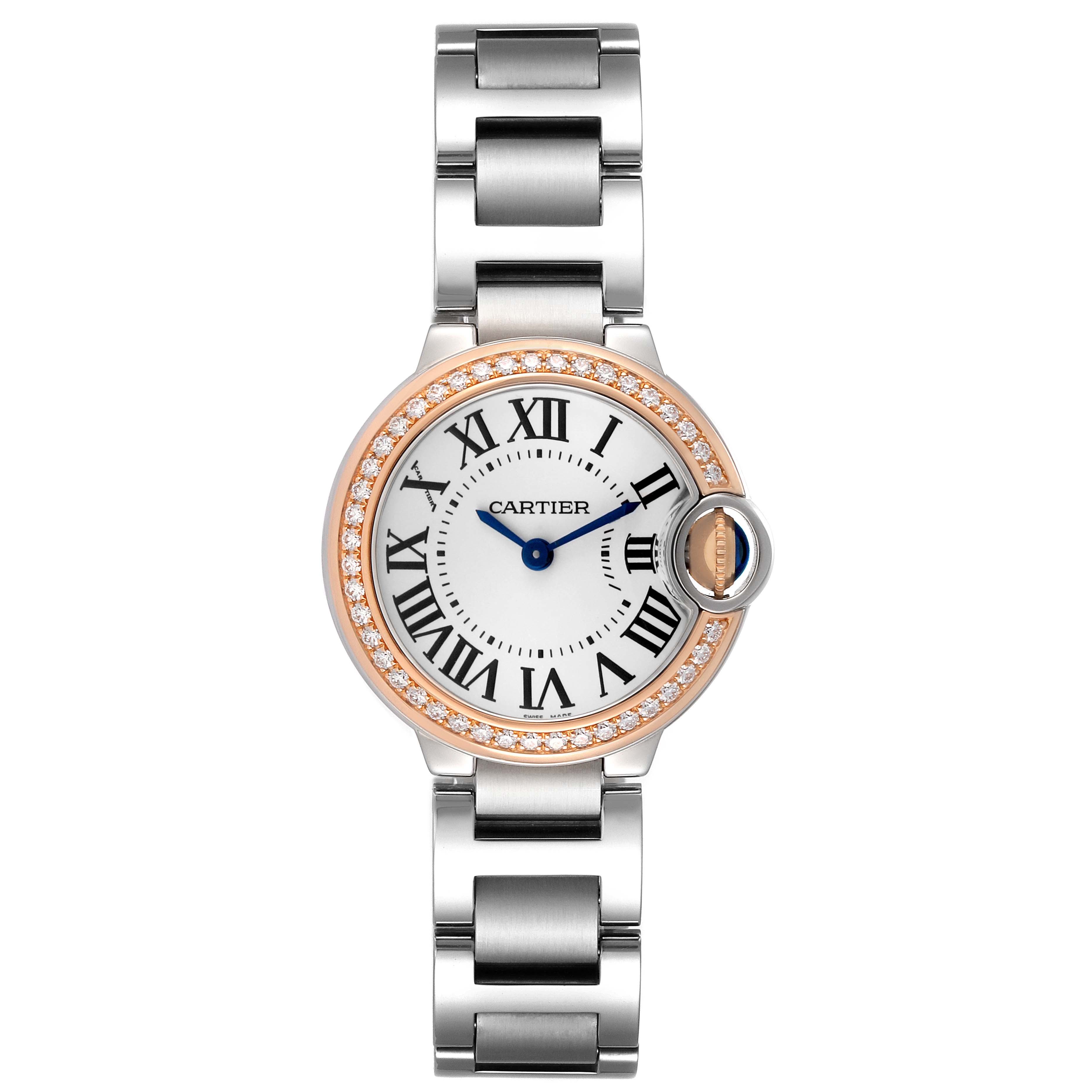 The Cartier Ballon Bleu WE902079 Women's Steel and Gold (two tone) Silver Dial watch is shown from a top view, highlighting its round face, Roman numerals, and metal bracelet.