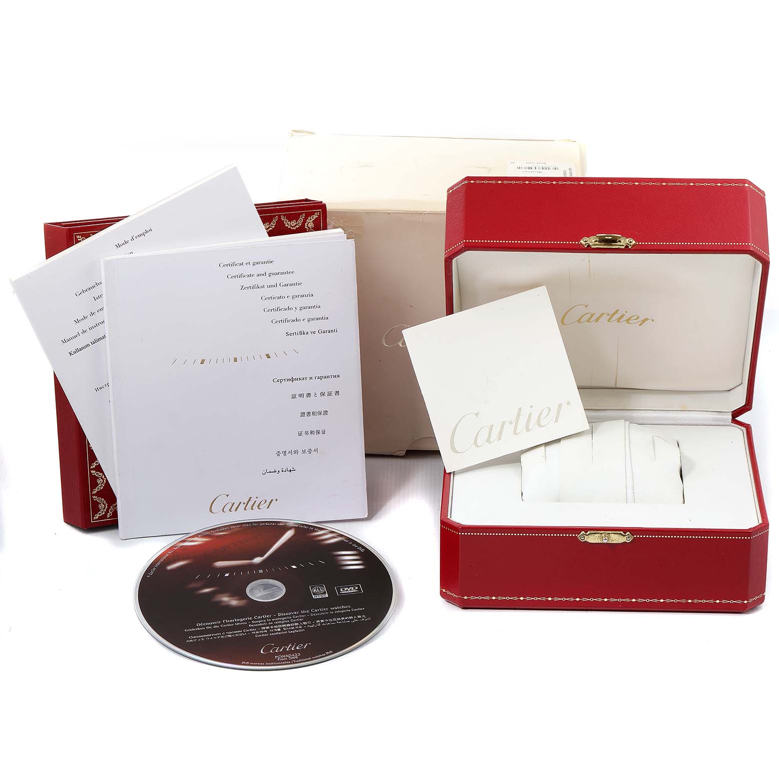 The image shows Cartier Pasha W31077U2 Men
s Stainless Steel Black Dial W31077U2 Men
s Stainless Steel Black Dial watch accessories including a red watch box, paperwork, and a CD, all viewed from the front angle.