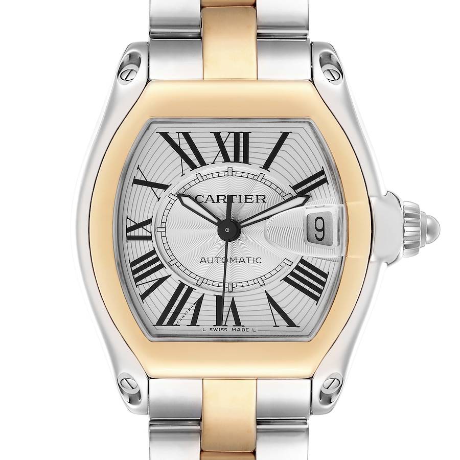 The Cartier Roadster W62031Y4 men's watch is shown from the front, displaying its dial, gold and silver case, Roman numerals, date window, and part of the bracelet.