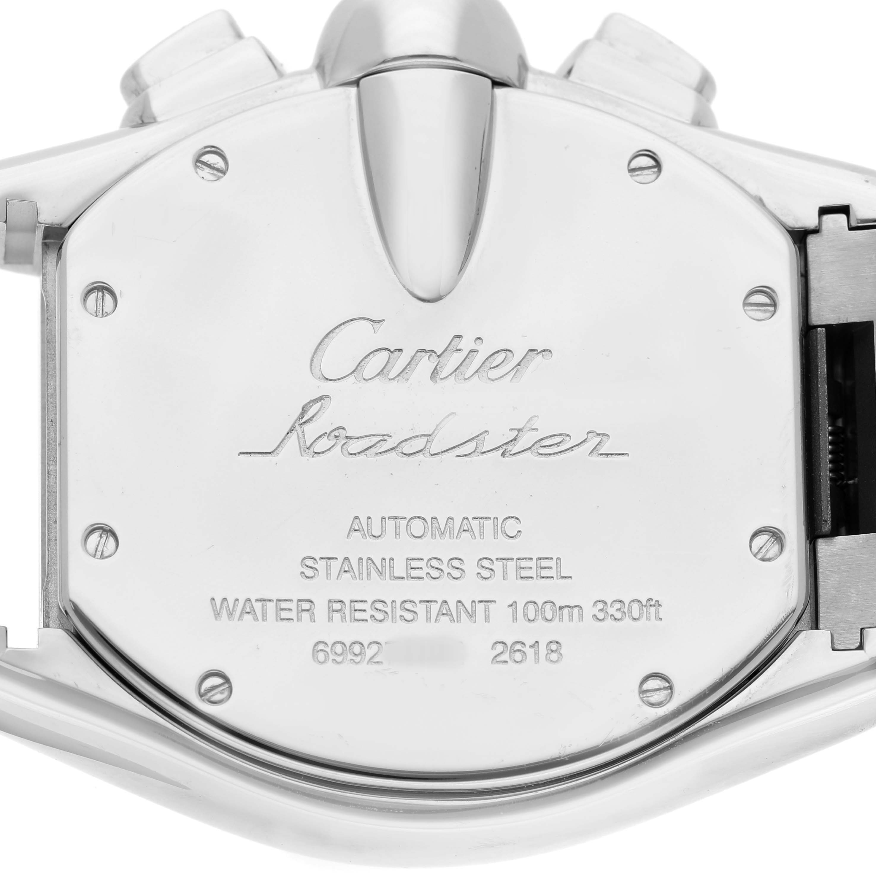 The image shows the back casing of the Cartier Roadster W62019X6 Men's Stainless Steel Silver Dial watch with engraved details about its specifications.