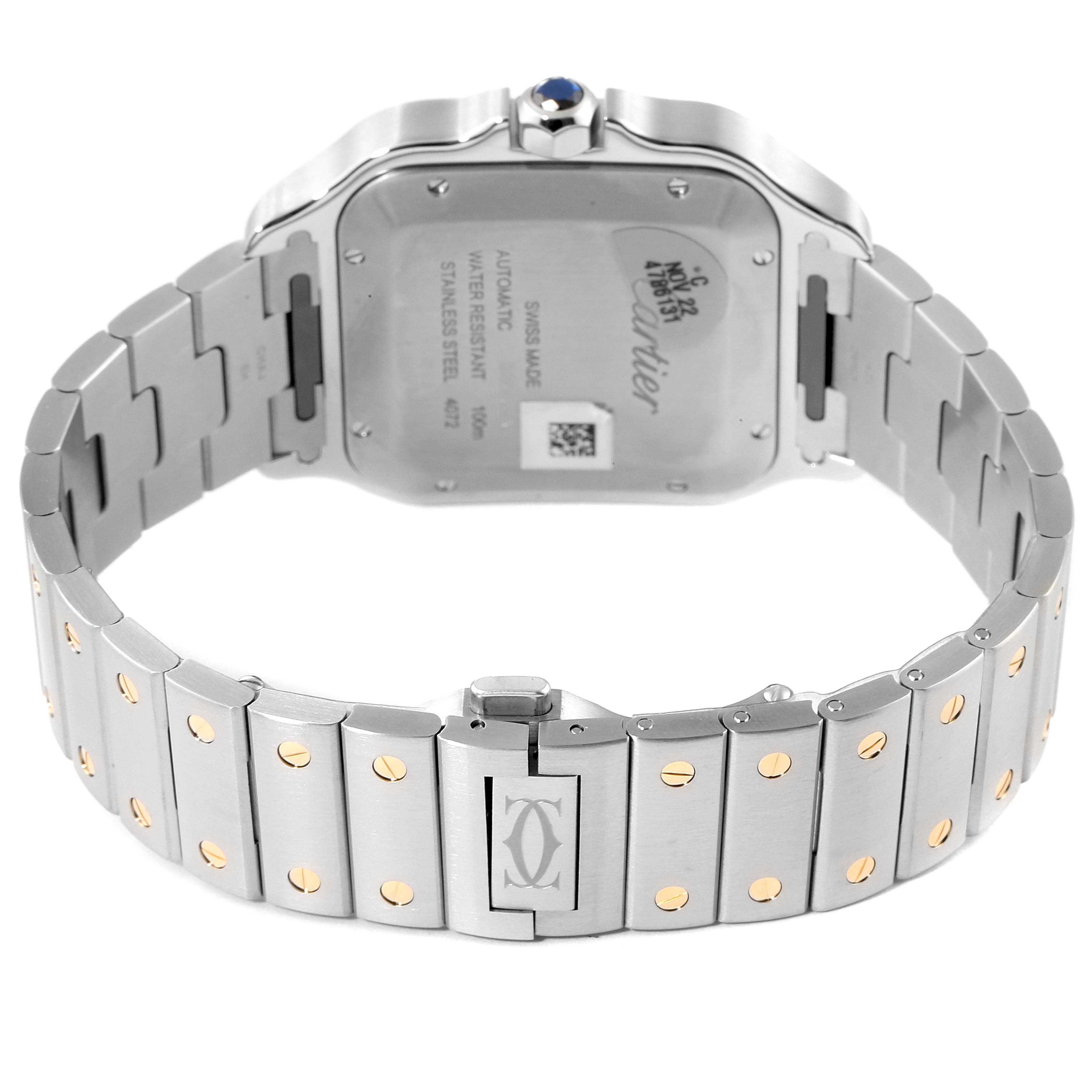 This image shows the back view of a Cartier Santos W2SA0009 Men's Steel and Gold (two tone) Silver Dial W2SA0009 Men's Steel and Gold (two tone) Silver Dial model watch, highlighting its metal bracelet and case back.