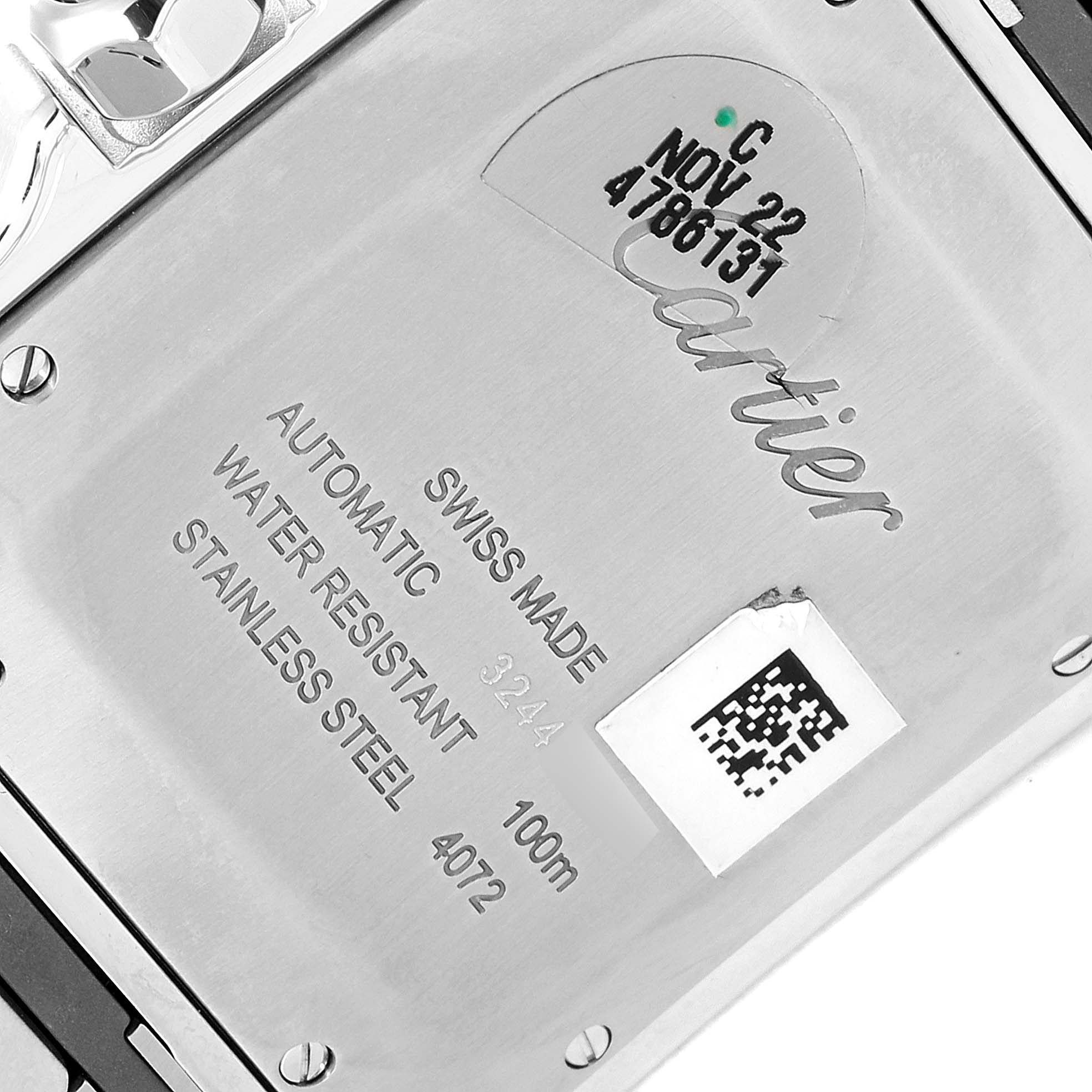 Close-up view of the back case of a Cartier Santos W2SA0009 Men's Steel and Gold (two tone) Silver Dial W2SA0009 Men's Steel and Gold (two tone) Silver Dial watch showing its engravings and water resistance details.