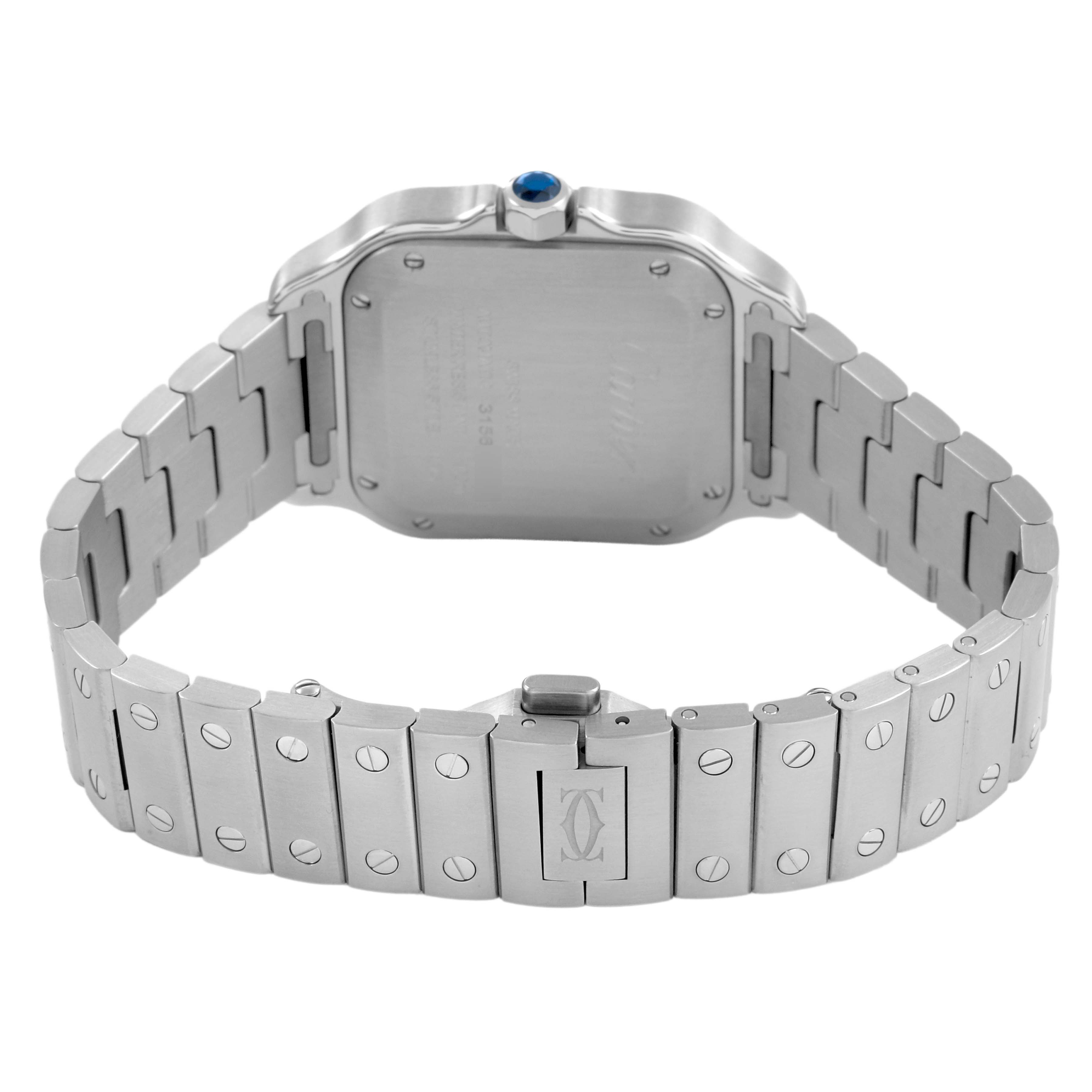 The image shows the back of the Cartier Santos W4SA0005 Men's Stainless Steel Silver Dial watch, including its case, bracelet, and clasp with a logo.