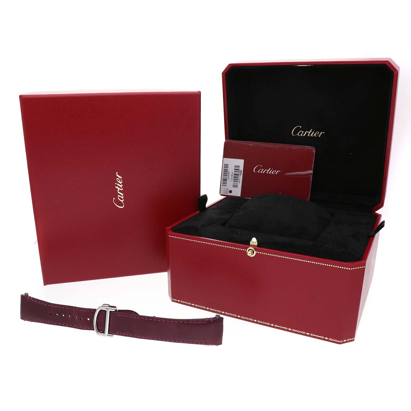 The image shows Cartier's Santos model watch box, spare strap, and warranty card in a classic red presentation.
