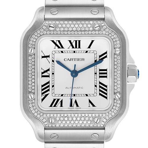 The image shows a front view of a Cartier Santos W4SA0005 Men's Stainless Steel Silver Dial watch, highlighting its diamond-studded bezel and Roman numeral dial.