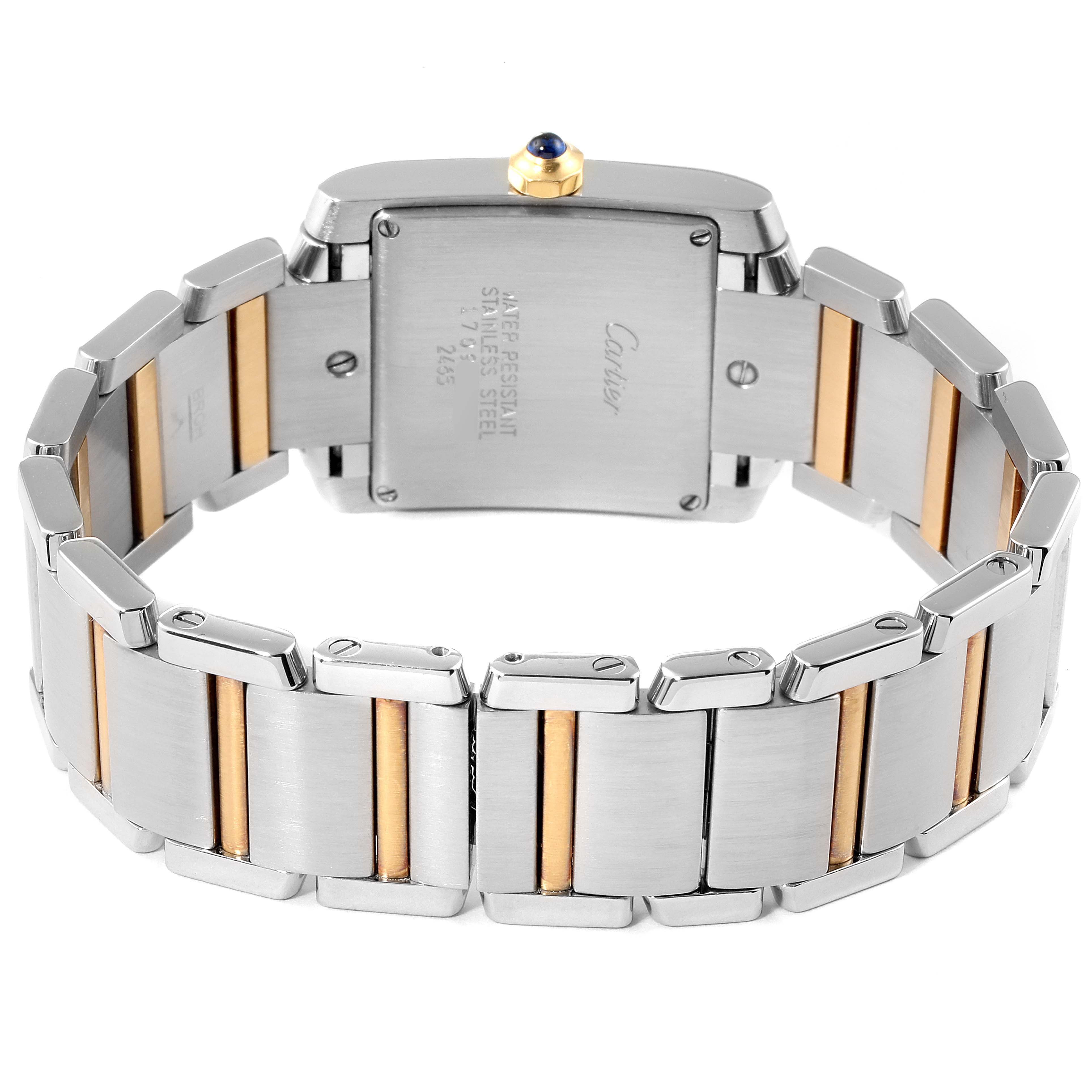 The image shows the back and bracelet of a Cartier Tank Française watch, highlighting the stainless steel and gold links.