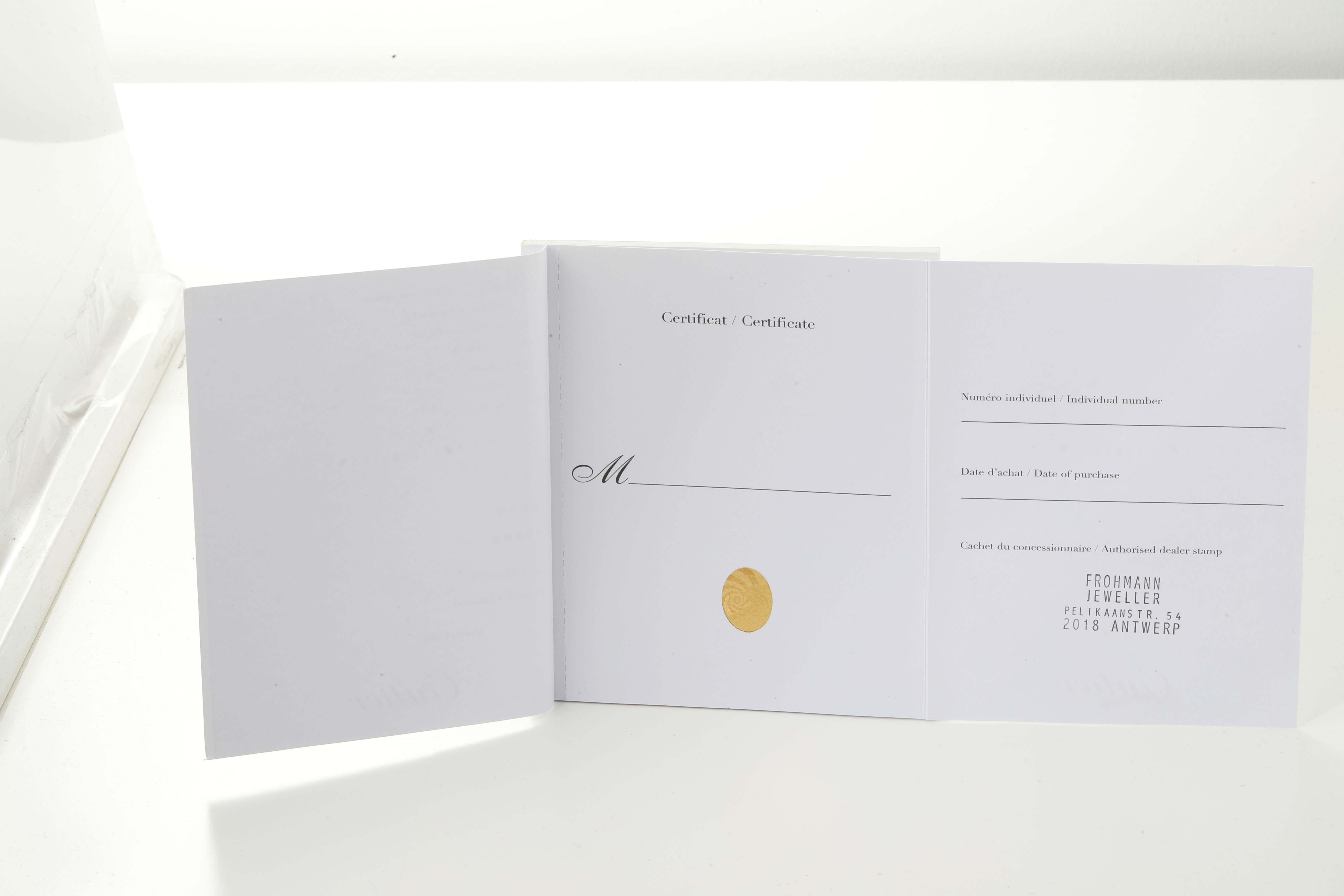 The image shows an open certificate booklet for the Cartier Tank Francaise W51007Q4 Women's Steel and Gold (two tone) Silver Dial W51007Q4 Women's Steel and Gold (two tone) Silver Dial model watch.