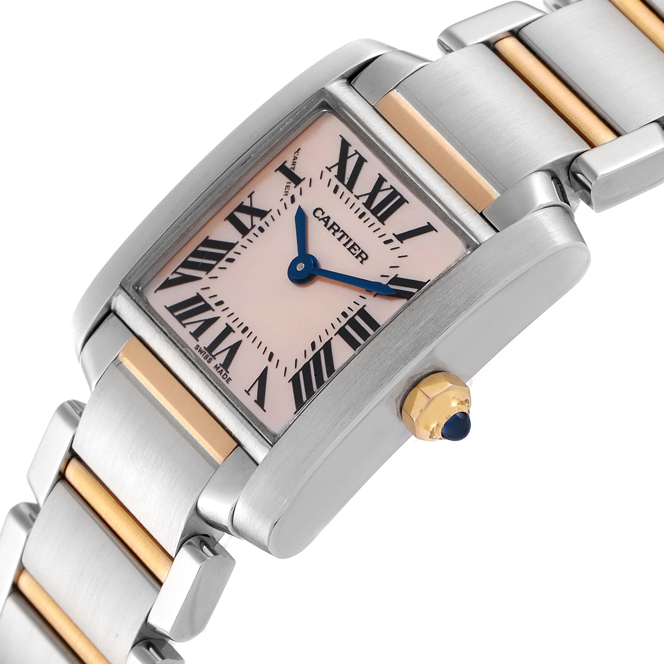 The Cartier Tank Francaise W51027Q4 Women's Steel and Gold (two tone) Mother of Pearl Dial W51027Q4 Women's Steel and Gold (two tone) Mother of Pearl Dial watch is shown at an angle highlighting its face, bracelet, and sapphire cabochon crown.