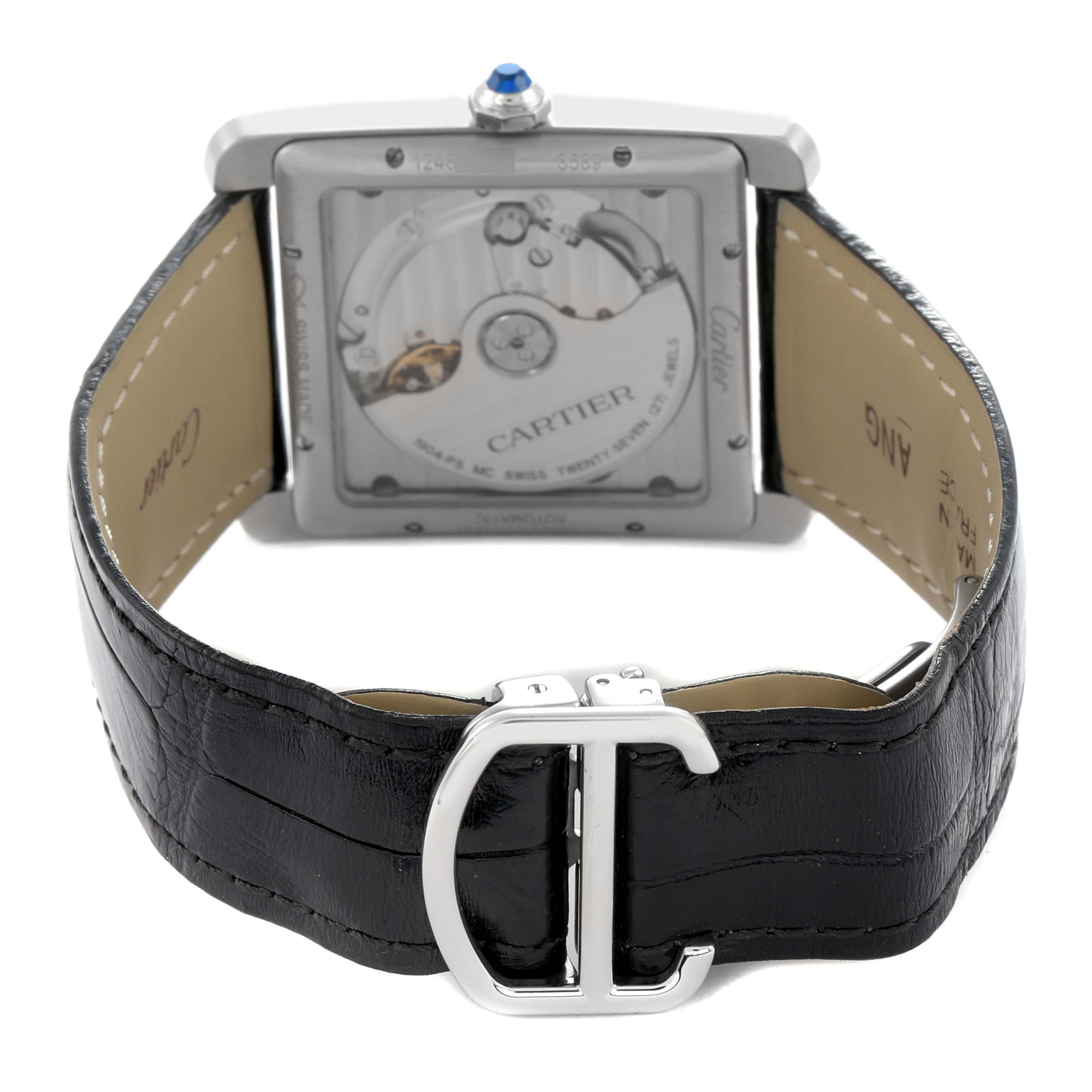 The image shows the back of a Cartier Tank MC WSTA0010 Men
s Stainless Steel Blue Dial watch, highlighting its movement and black leather strap with a silver buckle.