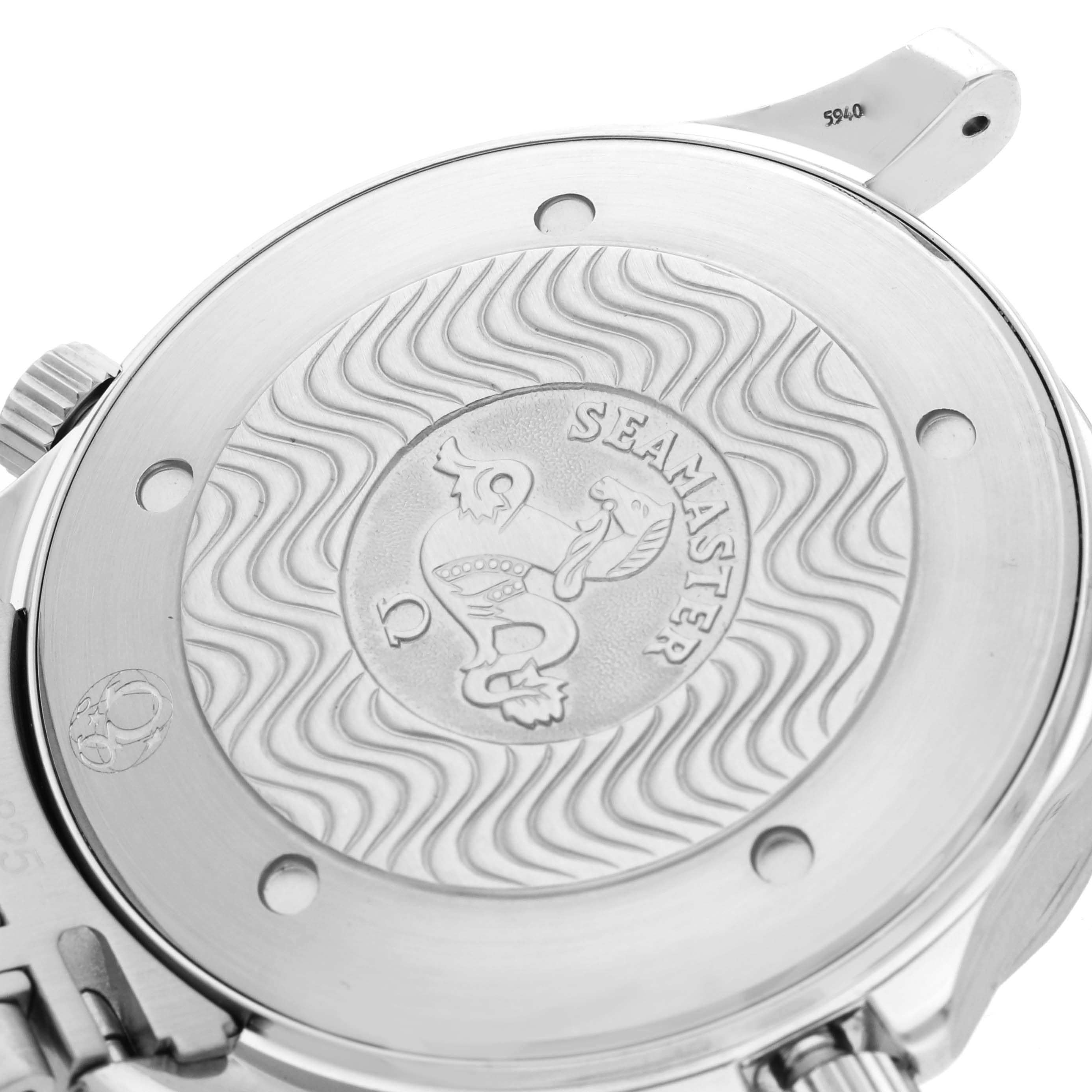 The image shows the case back of the Omega Seamaster 2541.80.00 Men
s Stainless Steel Blue Dial watch, highlighting its wavy pattern and embossed logo.