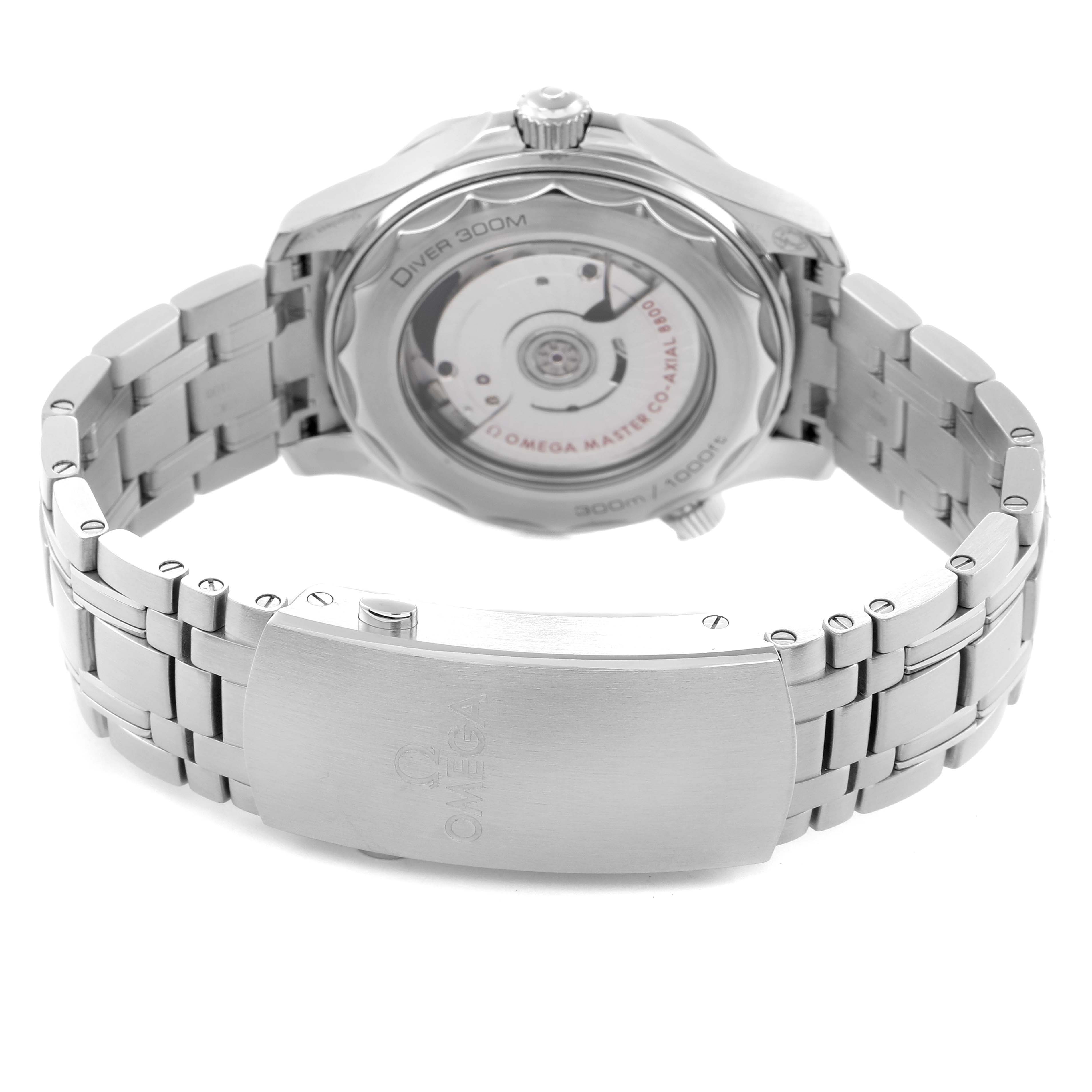 The Omega Seamaster 210.30.42.20.03.001 Men
s Stainless Steel Blue Dial watch is shown from the rear, highlighting the exhibition case back and bracelet clasp.