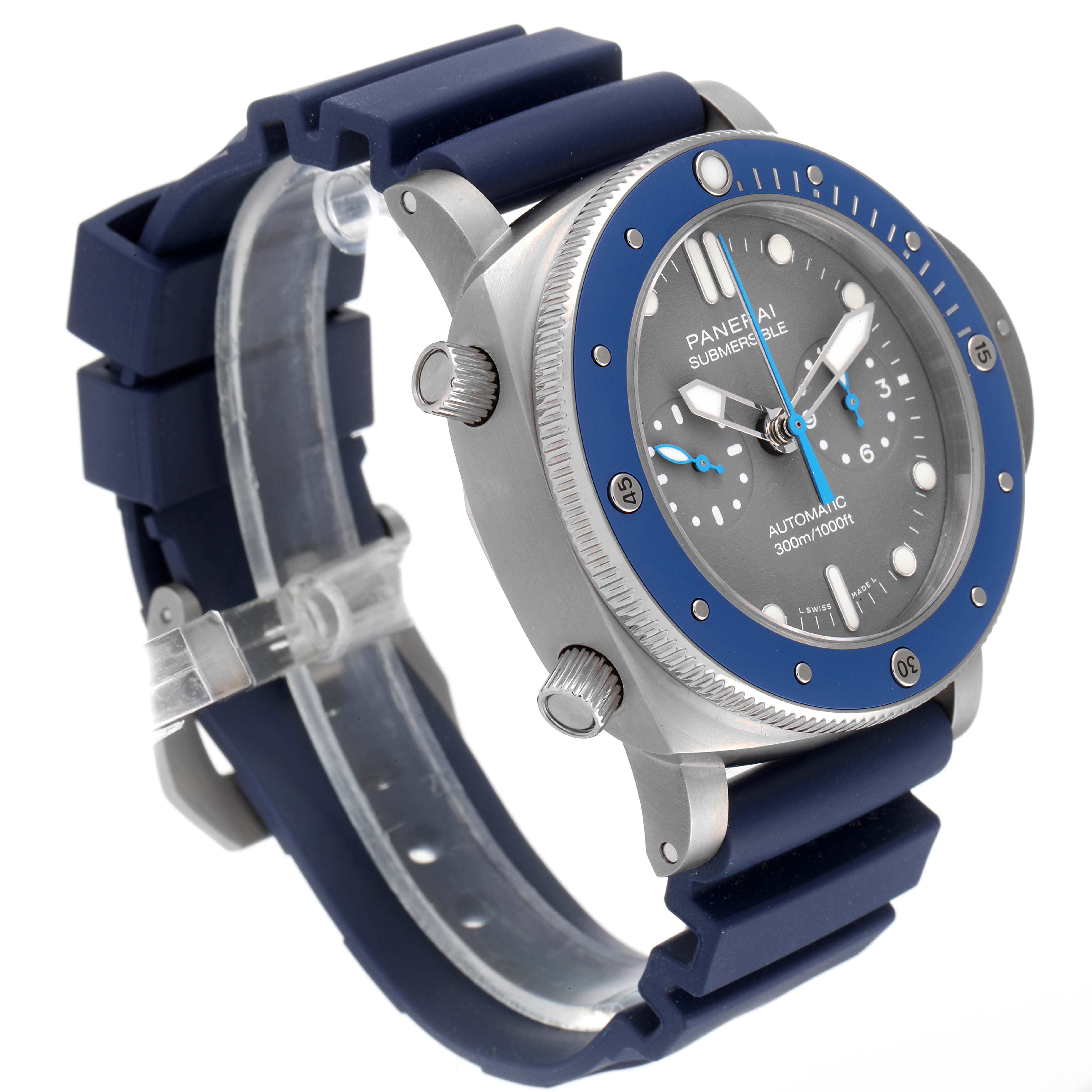 The Panerai Submersible PAM00982 Men's Titanium Grey Dial PAM00982 Men's Titanium Grey Dial watch is shown at an angle highlighting its face, bezel, crown, and blue rubber strap.