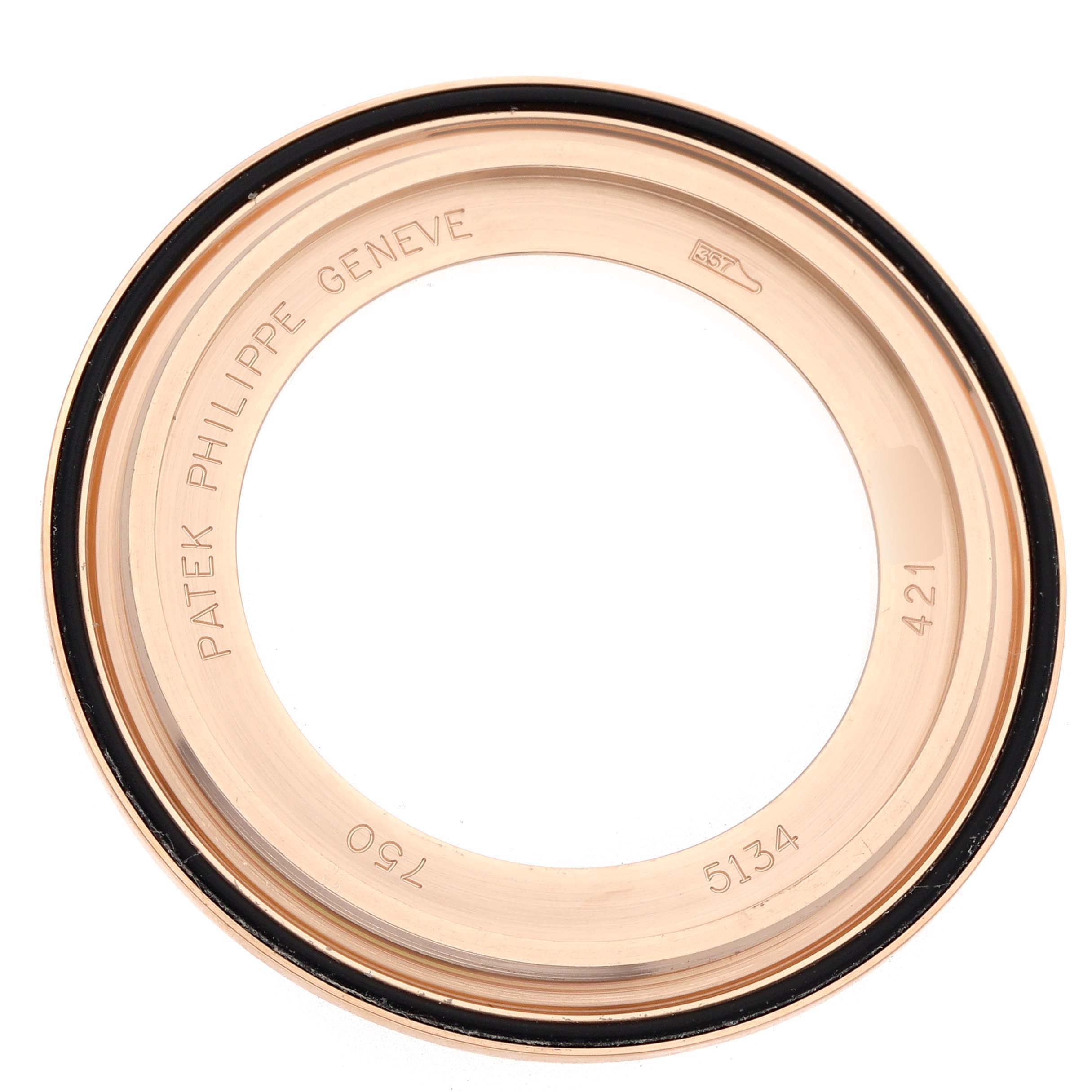 This image shows a top-down view of the bezel for a Patek Philippe Calatrava 5134R Men
s Rose Gold White Dial watch.