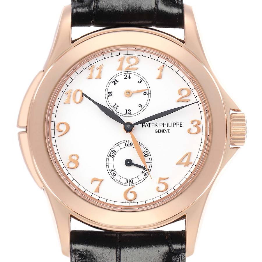 The image shows a front-facing view of the Patek Philippe Calatrava model 5134 men's watch, highlighting its white dial, gold hour markers, and black leather strap.