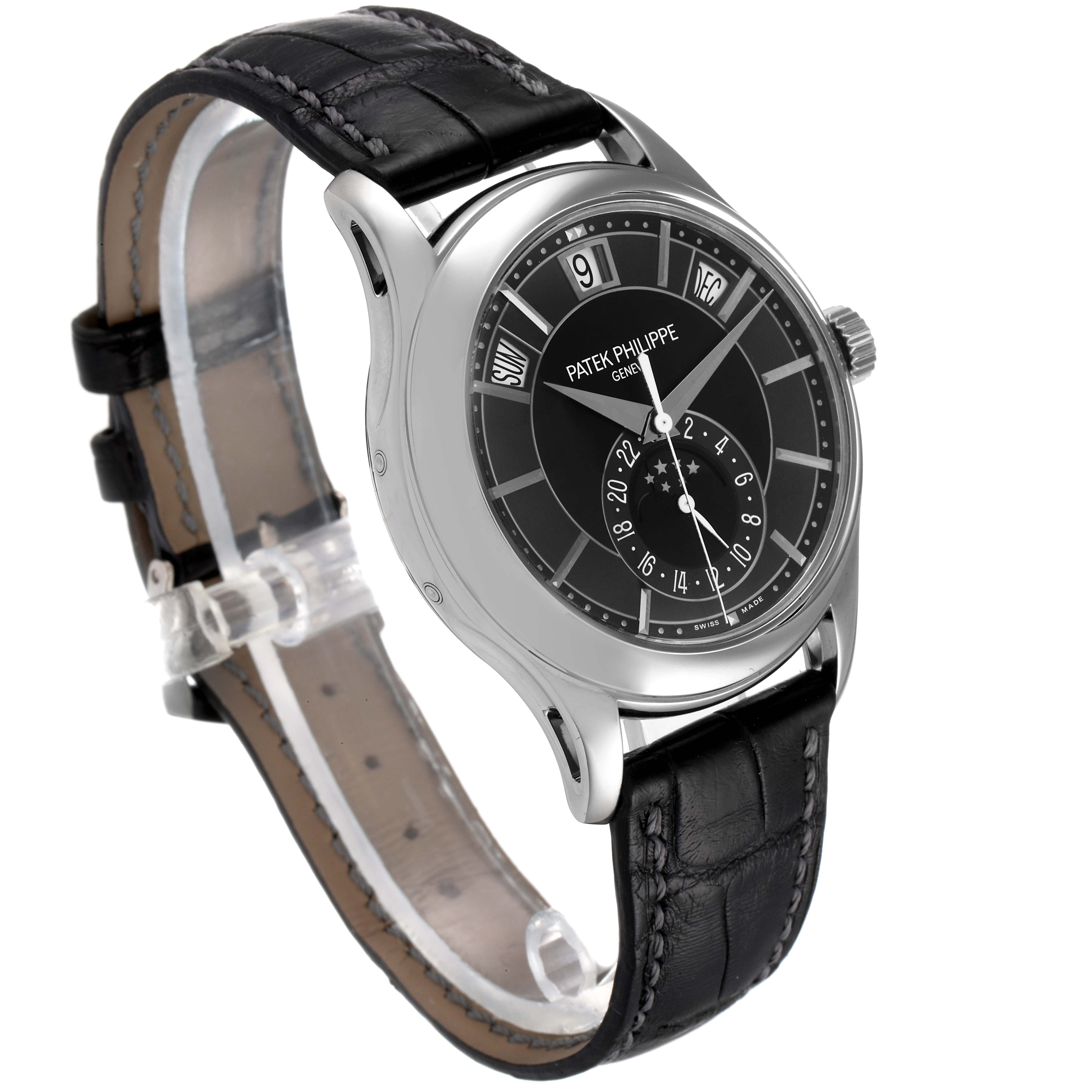 The image shows a side-angle view of a Patek Philippe Complications 5205G - 010 Men's White Gold Grey Dial 5205G - 010 Men's White Gold Grey Dial watch, highlighting the face, strap, and buckle.