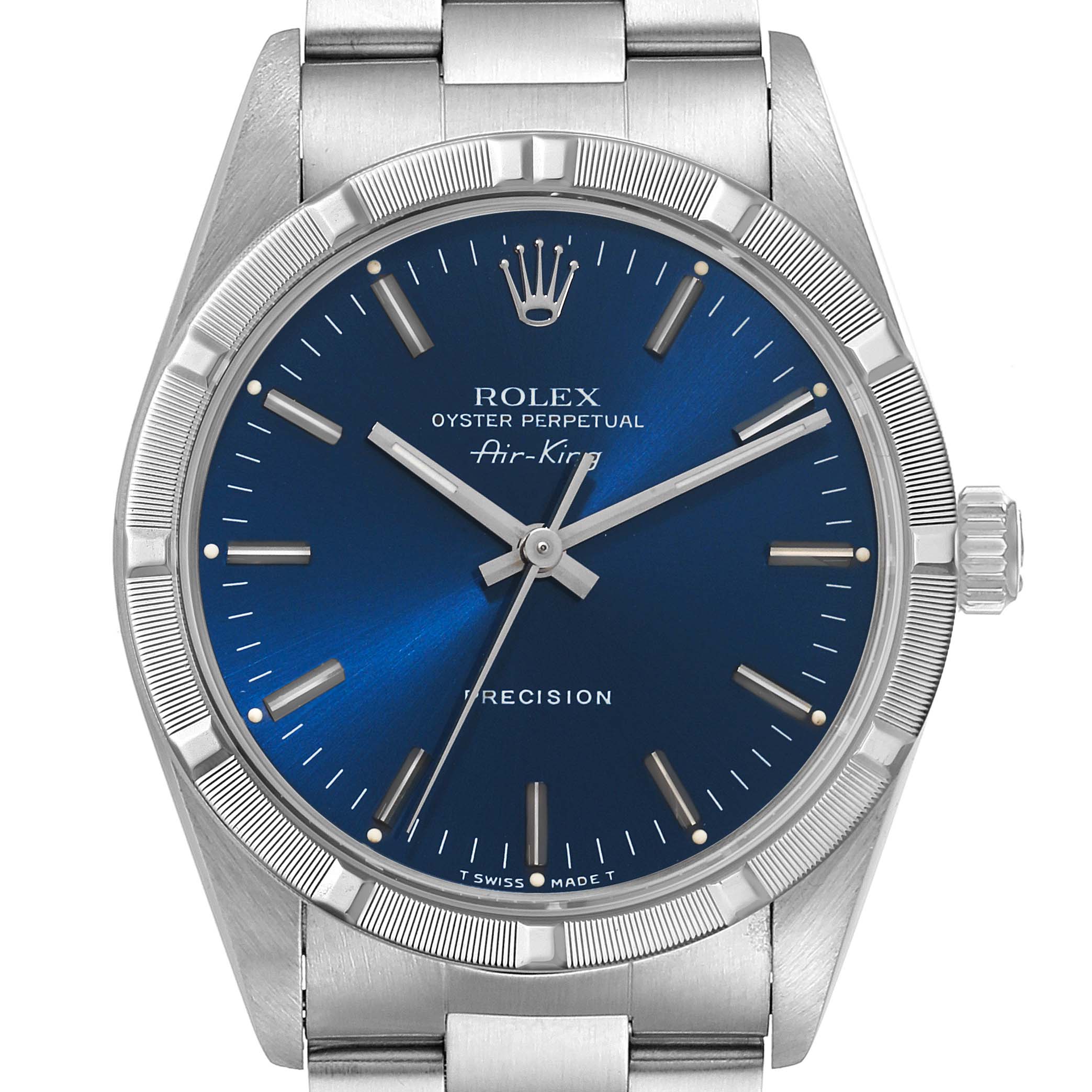 This image shows the face and bezel of a Rolex Air-King 14010 Men's Stainless Steel Blue Dial 14010 Men's Stainless Steel Blue Dial watch, with a blue dial and silver hour markers.