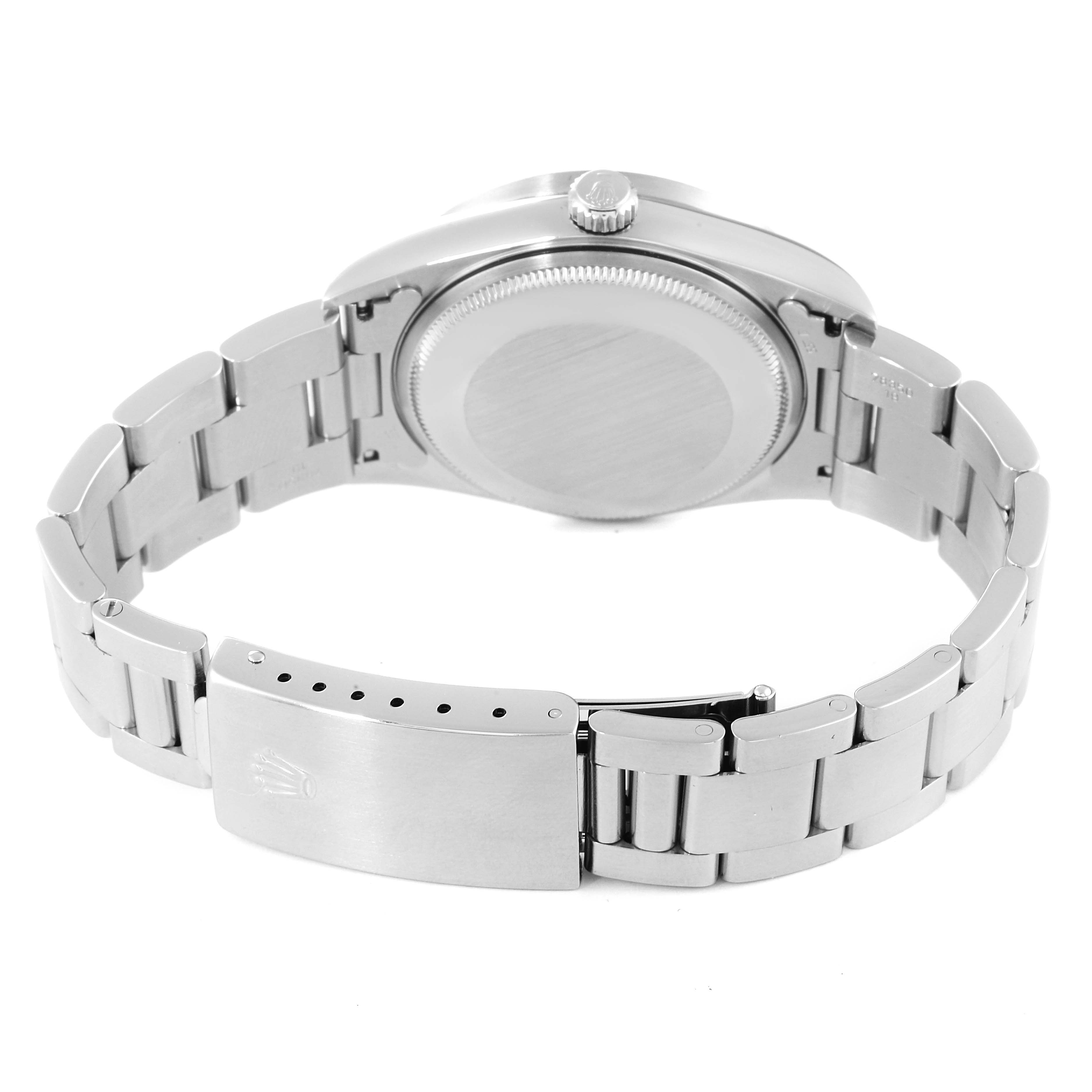 This image shows the back view of a Rolex Air-King 14010 Men's Stainless Steel Blue Dial 14010 Men's Stainless Steel Blue Dial watch, displaying the case back, bracelet, and clasp.