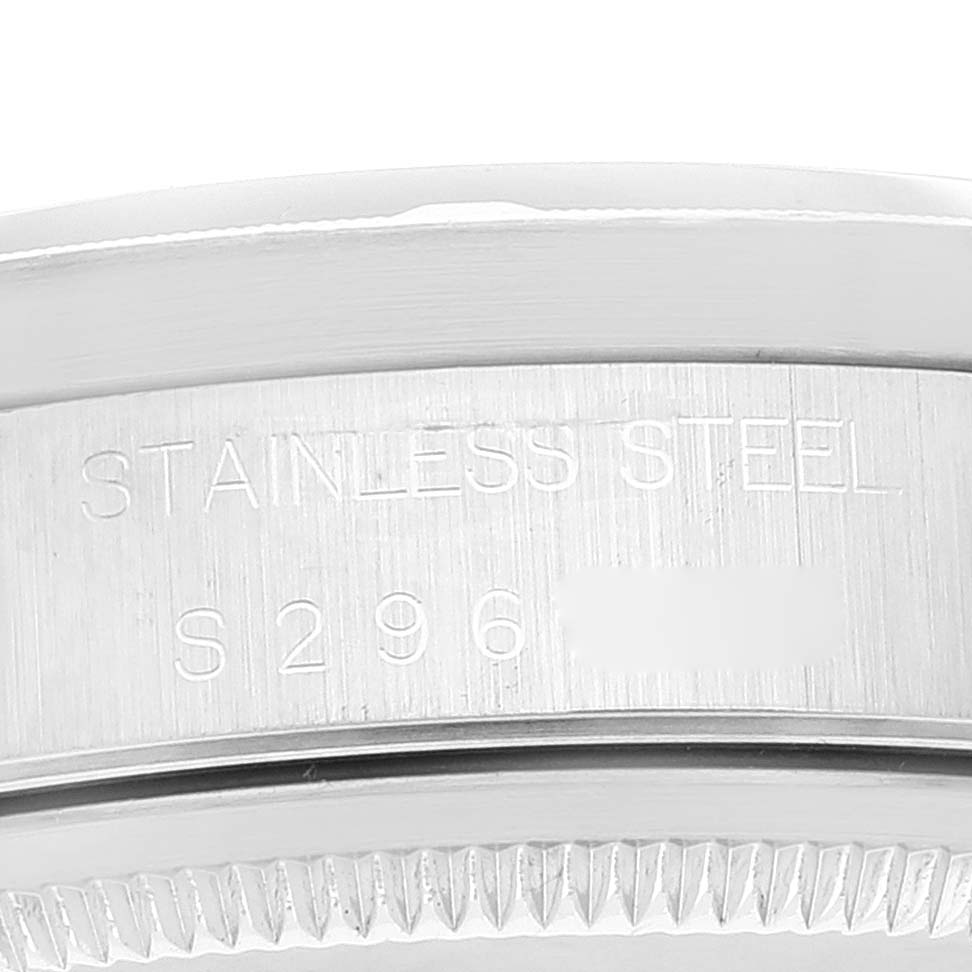 This image shows a close-up of the side engraving on the stainless steel case of a Rolex Air-King 14010 Men's Stainless Steel Blue Dial 14010 Men's Stainless Steel Blue Dial watch.