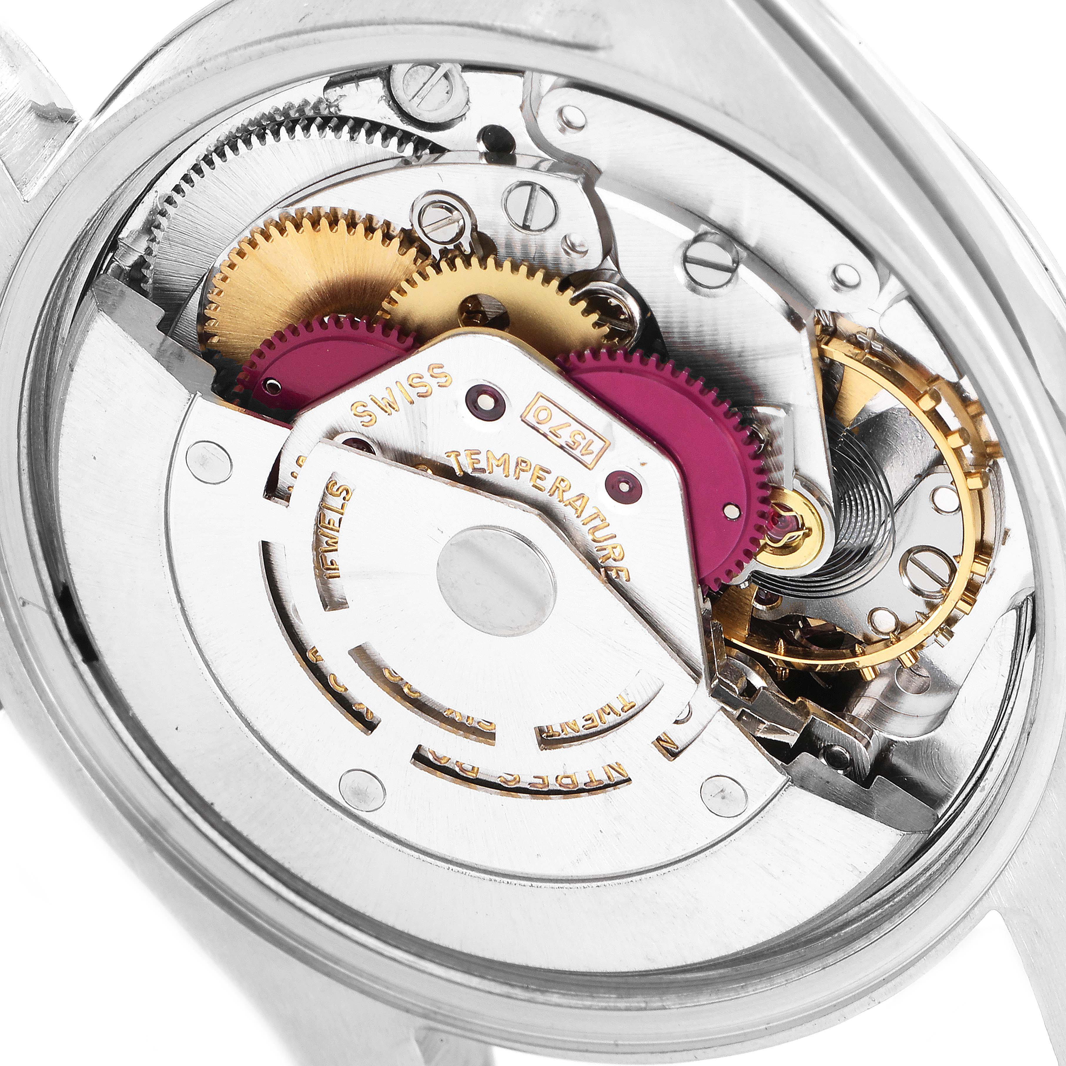 This image shows the inner mechanical workings of a Vintage Collection model Rolex watch from a close-up angle.