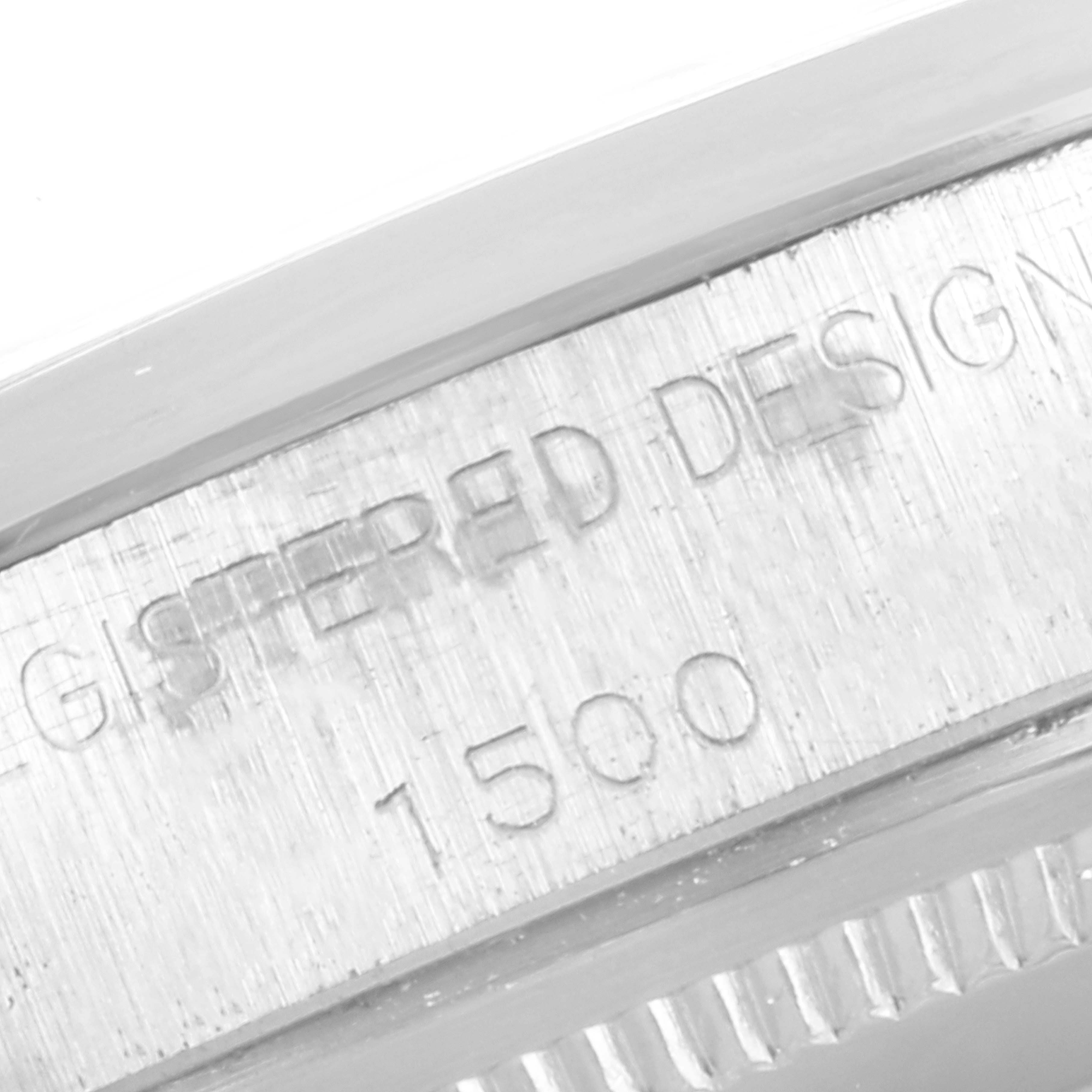 This image shows a close-up angle of the serial and model number, 1500, engraved on the edge of the Rolex Vintage Collection 1500 Men
s Stainless Steel Black Dial 1500 Men
s Stainless Steel Black Dial watch case.