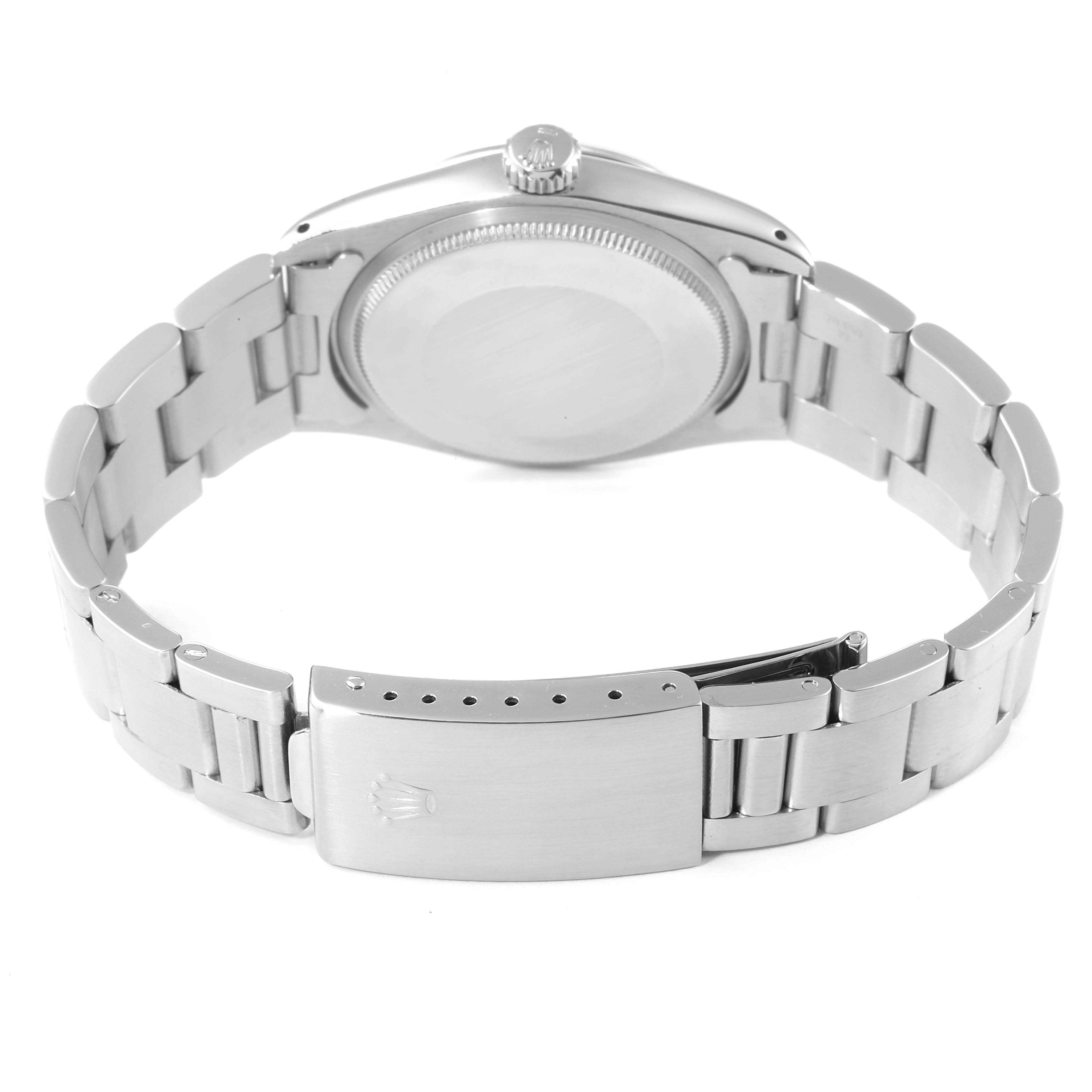 The image shows the backside and bracelet clasp of a Vintage Collection model Rolex watch.