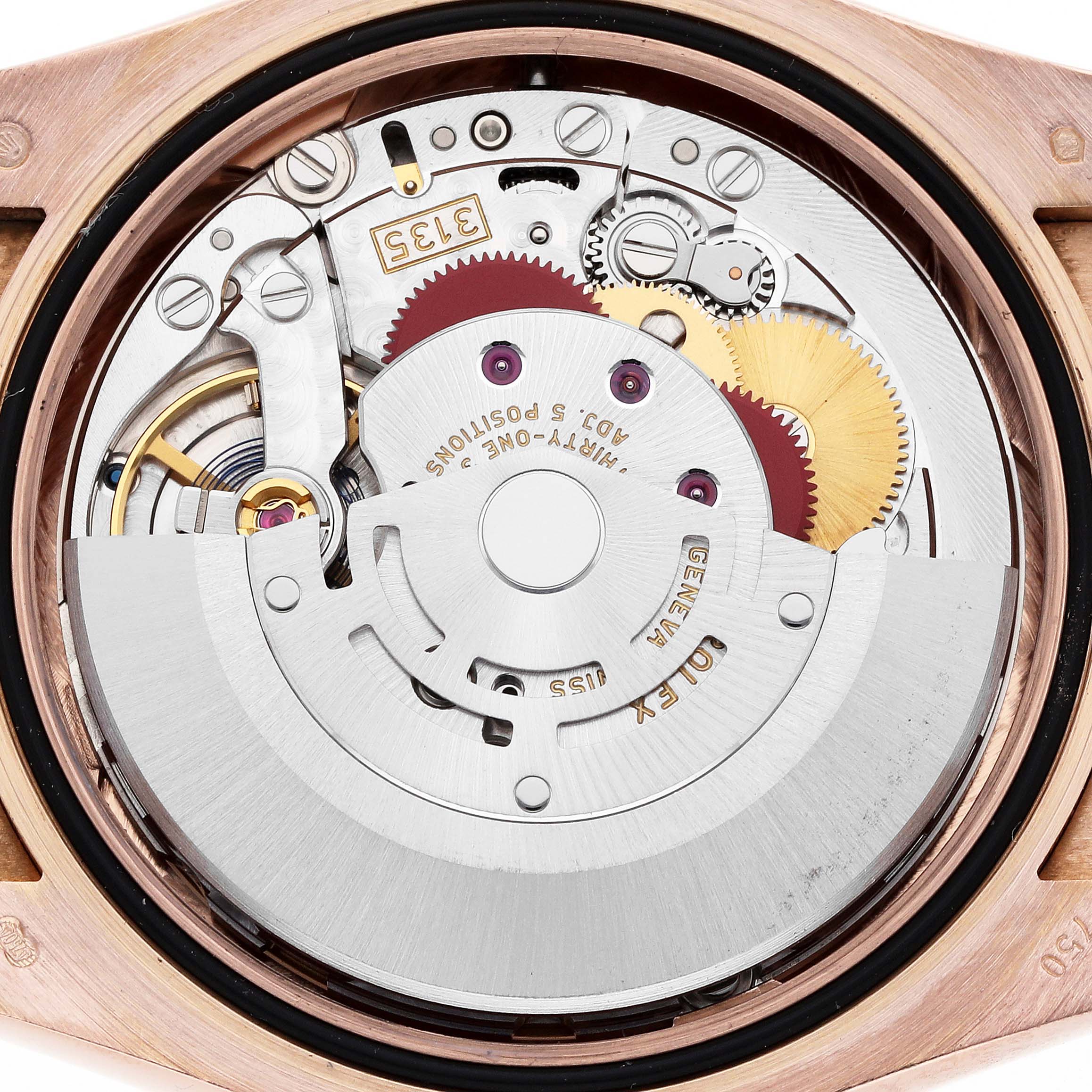 The image shows a close-up of the movement inside a Rolex Datejust 116185 Men
s Rose Gold Mother of Pearl Dial, highlighting gears and the rotor.