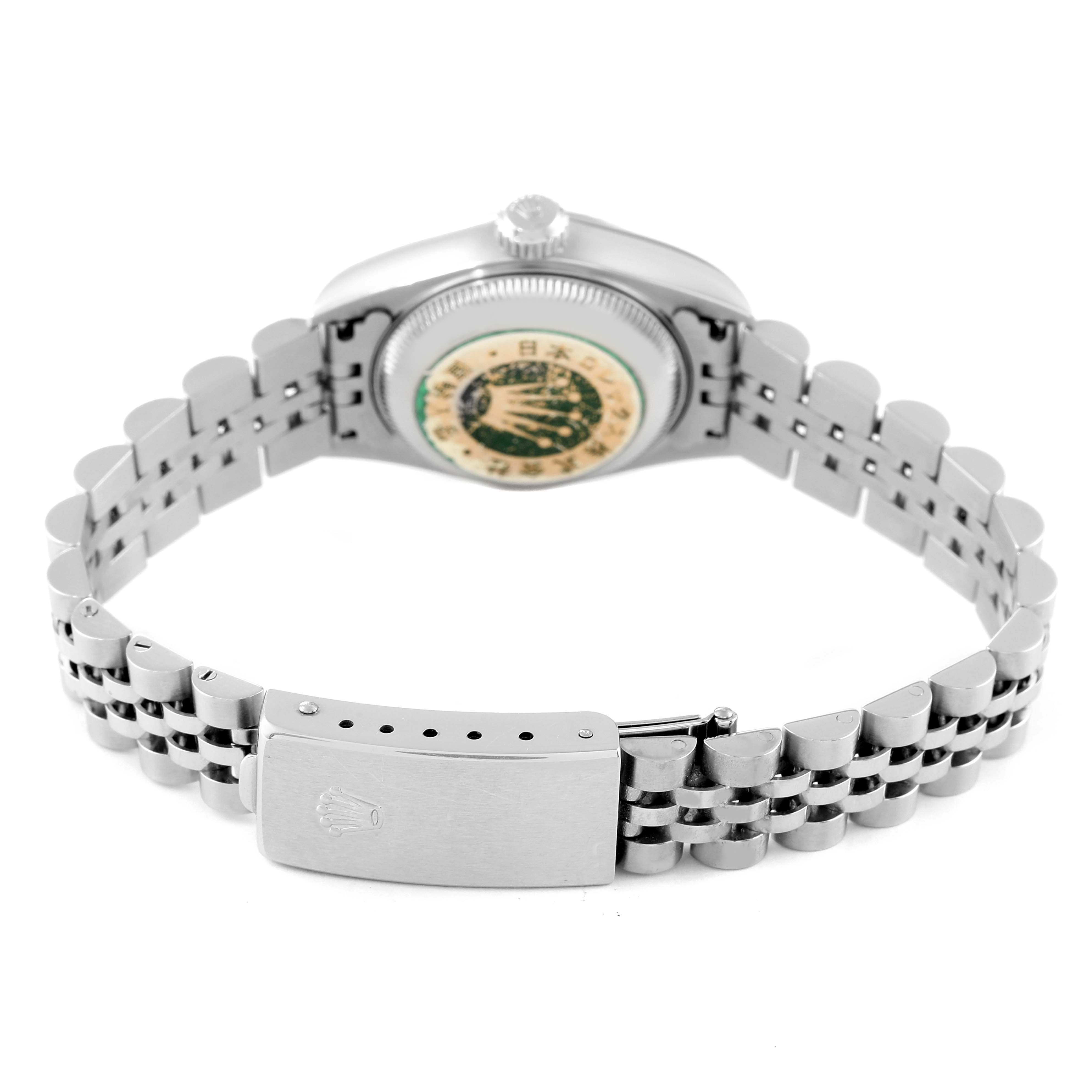 The image shows the back and bracelet of a Rolex Datejust 79174 Women
s Stainless Steel Pink Dial 79174 Women
s Stainless Steel Pink Dial watch, highlighting the case back and clasp.