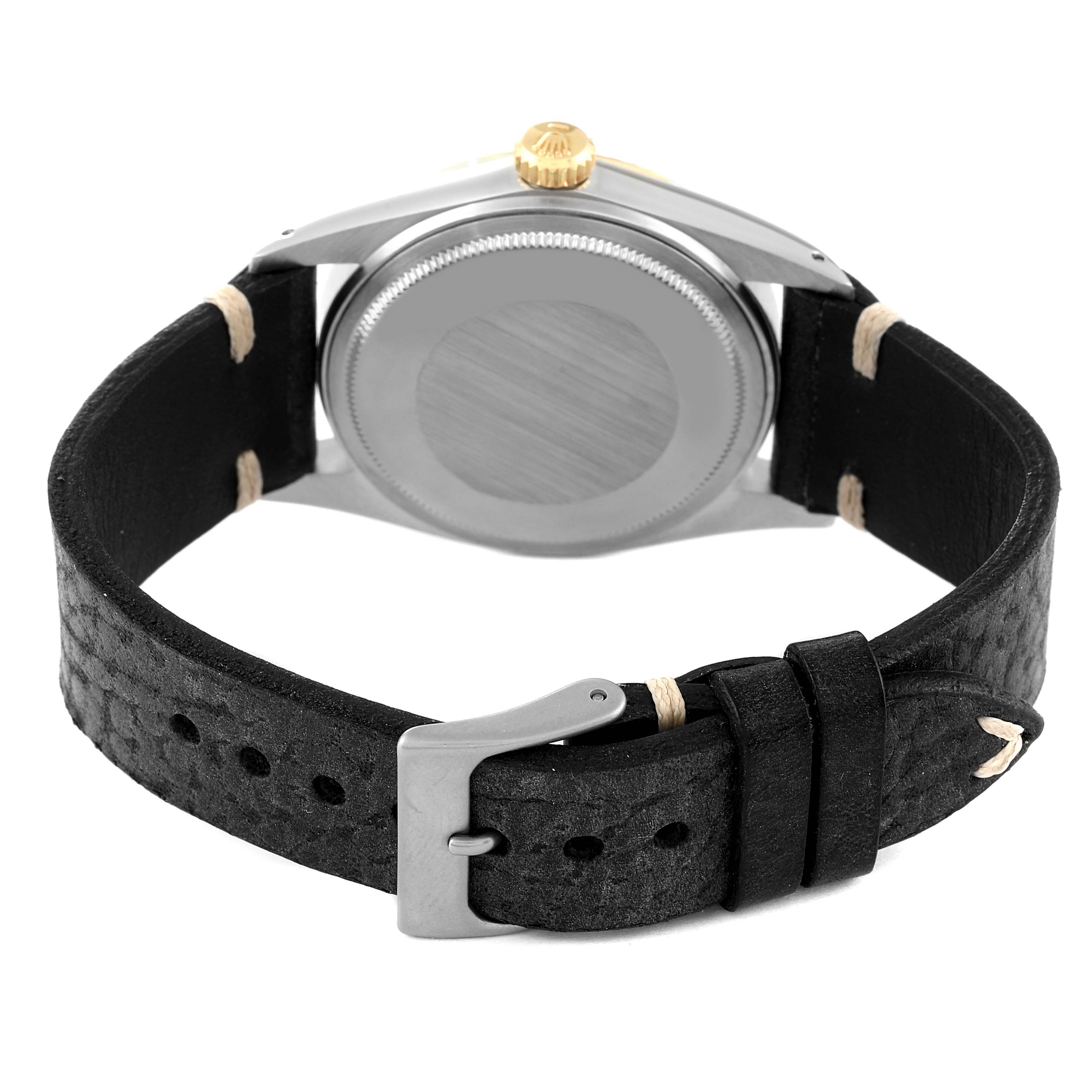 The image shows the back case, crown, and leather strap of a Rolex Vintage Collection 16013 Men's Steel and Gold (two tone) Black Dial 16013 Men's Steel and Gold (two tone) Black Dial model watch from a rear angle perspective.