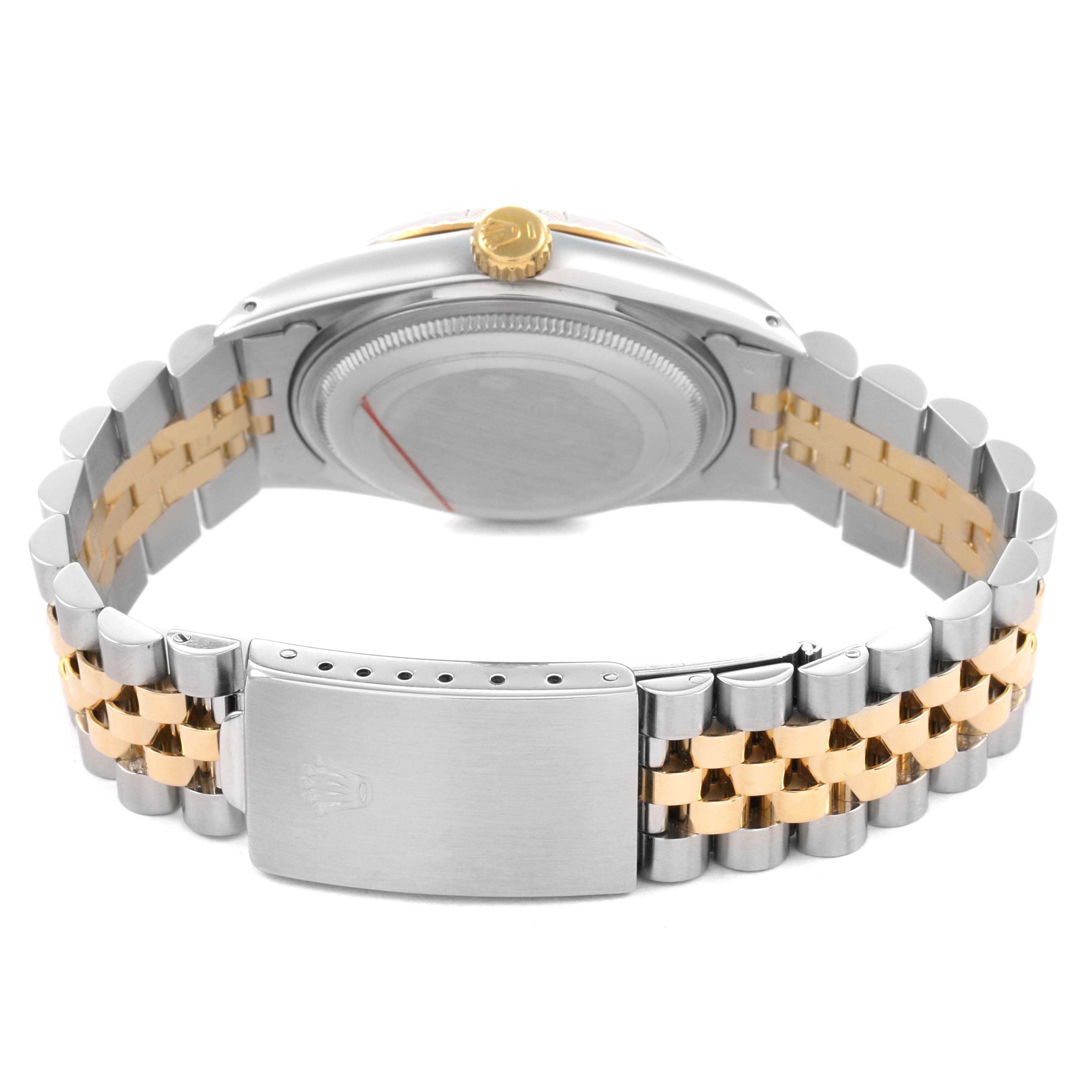 The image shows the back view of a Rolex Datejust 16013 Men's Steel and Gold (two tone) Champagne Dial, highlighting the two-tone band, clasp, and case back.