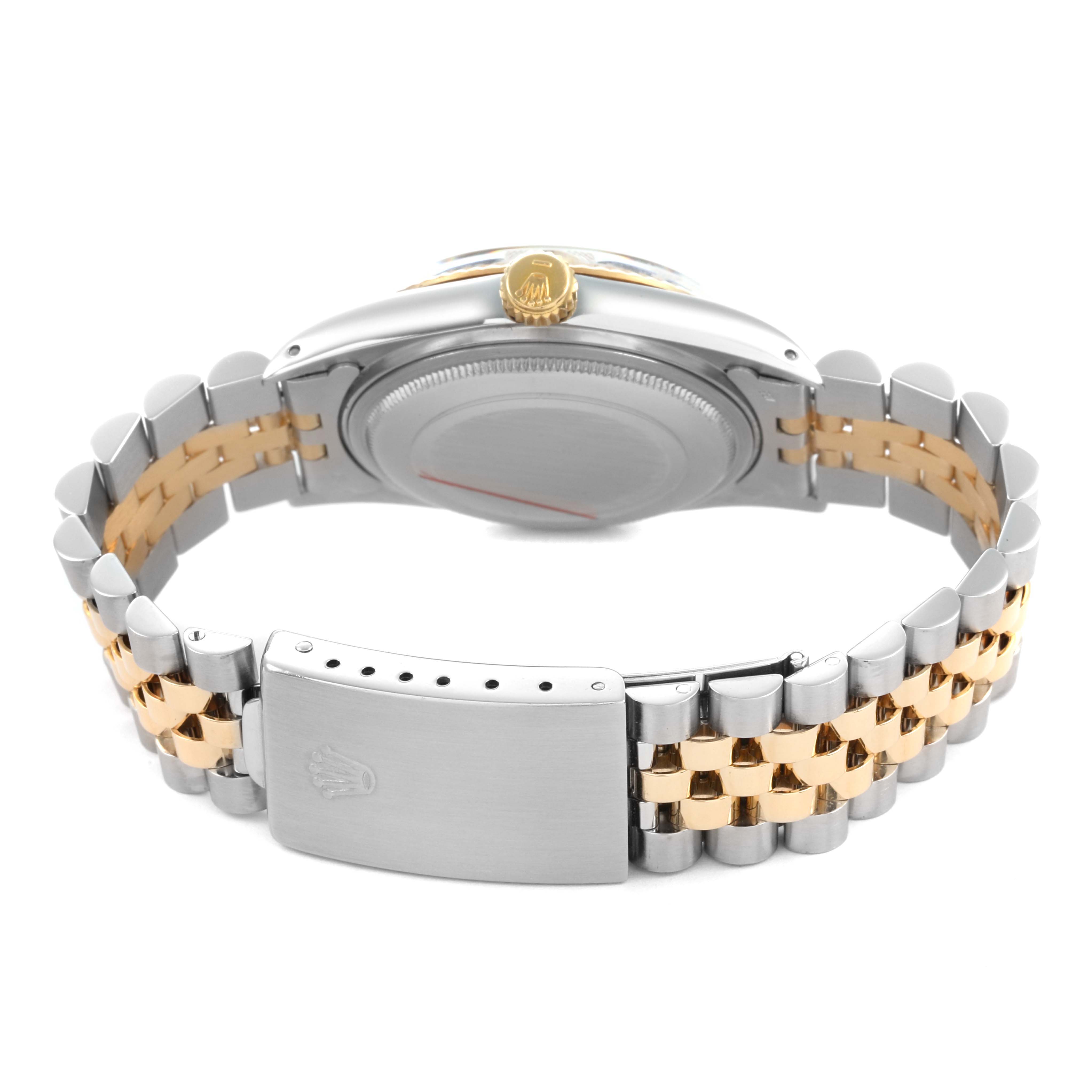 The Rolex Datejust 16013 Men's Steel and Gold (two tone) Champagne Dial watch is shown from the back, highlighting the two-tone bracelet and clasp.