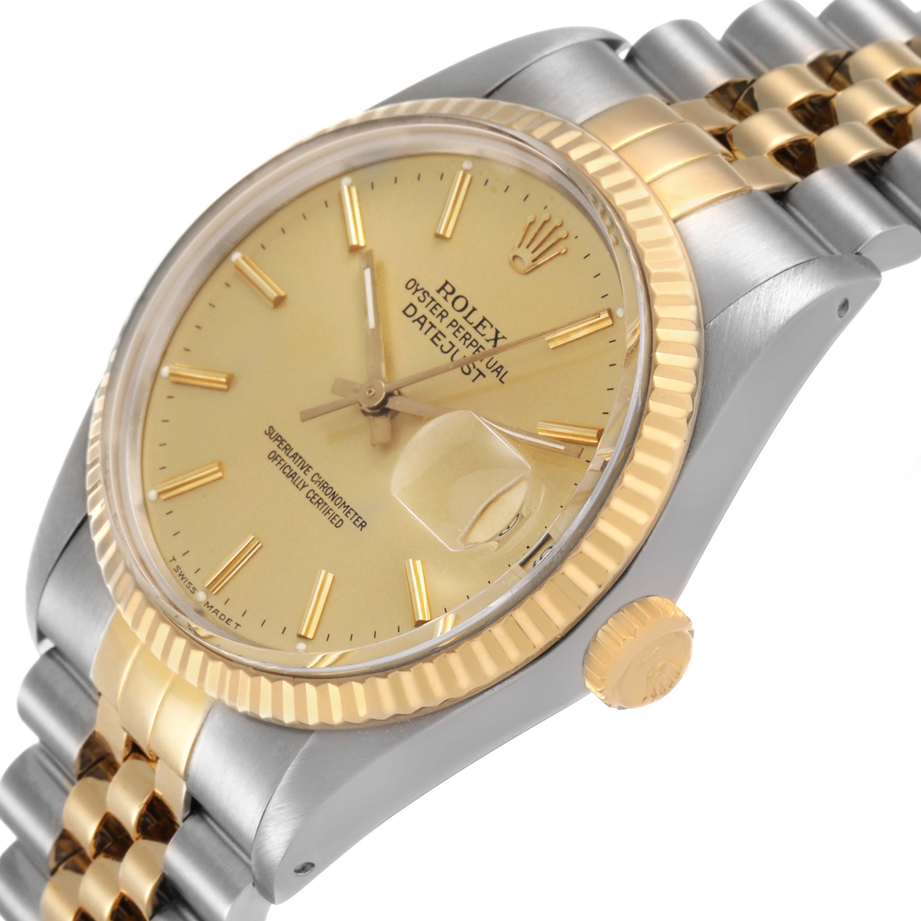 The Rolex Datejust 16013 Men's Steel and Gold (two tone) Champagne Dial watch is shown at an angle highlighting the face, bezel, crown, and part of the bracelet.
