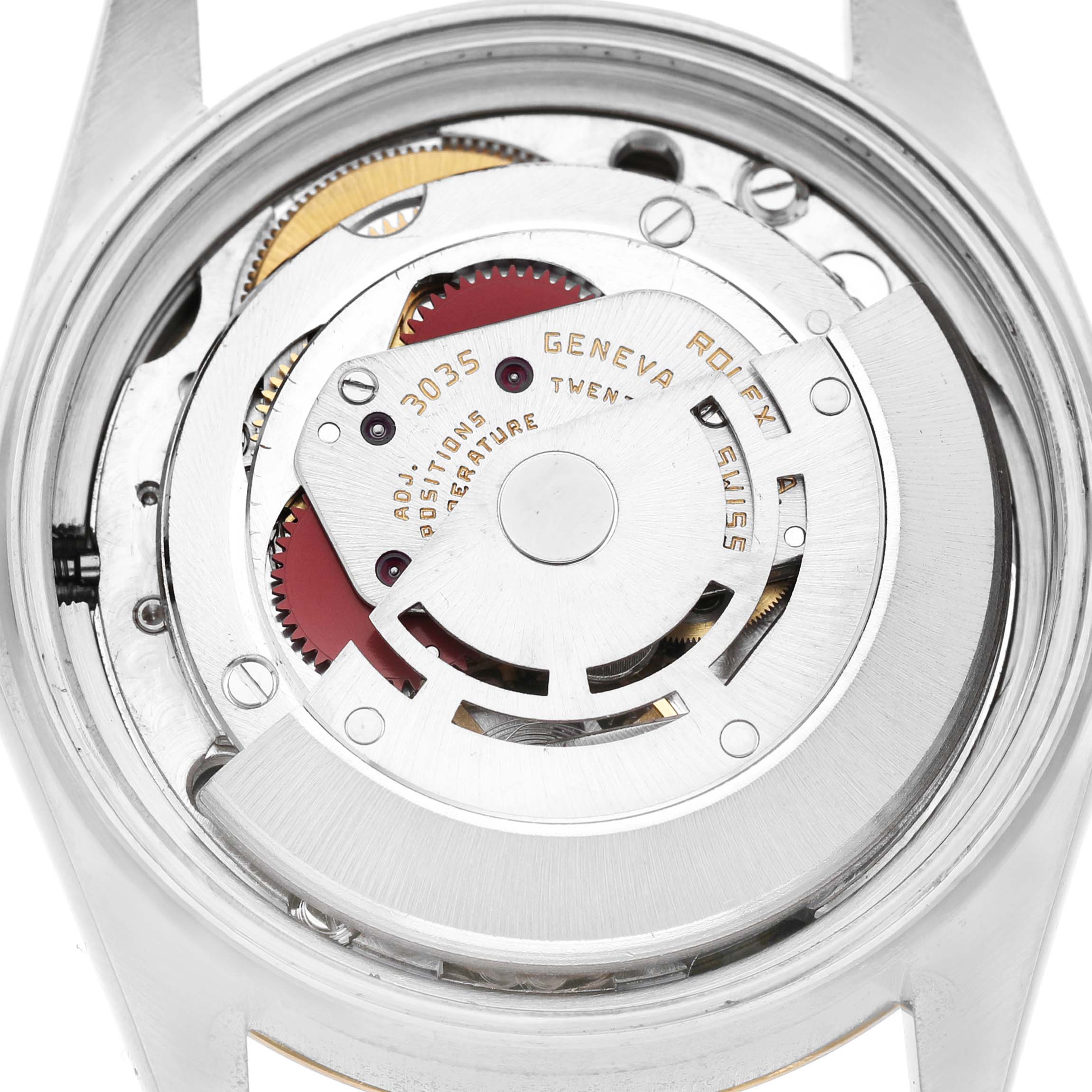 The image shows the open back view of a Rolex Datejust 16013 Men's Steel and Gold (two tone) Champagne Dial, highlighting the movement and rotor mechanism.