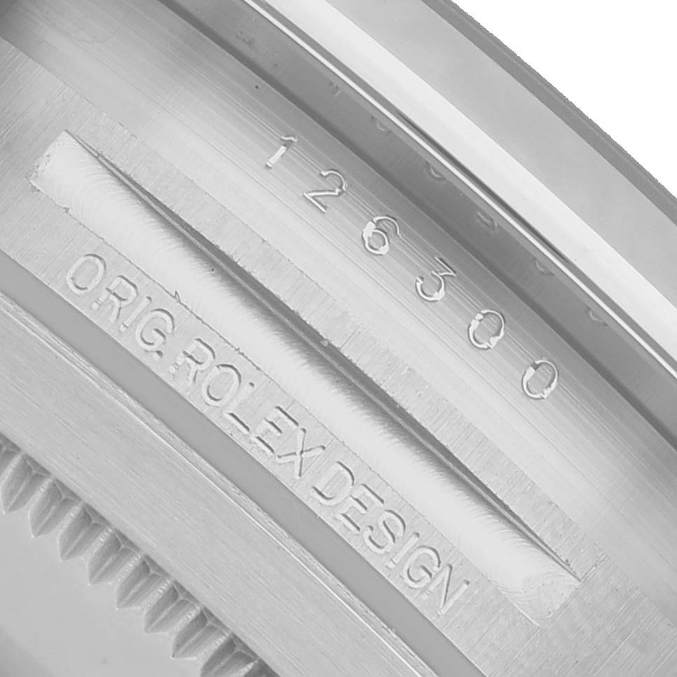 The image shows a close-up of the Rolex Datejust 41 126300 Men's Stainless Steel Black Dial's case engraving with the model number in focus.